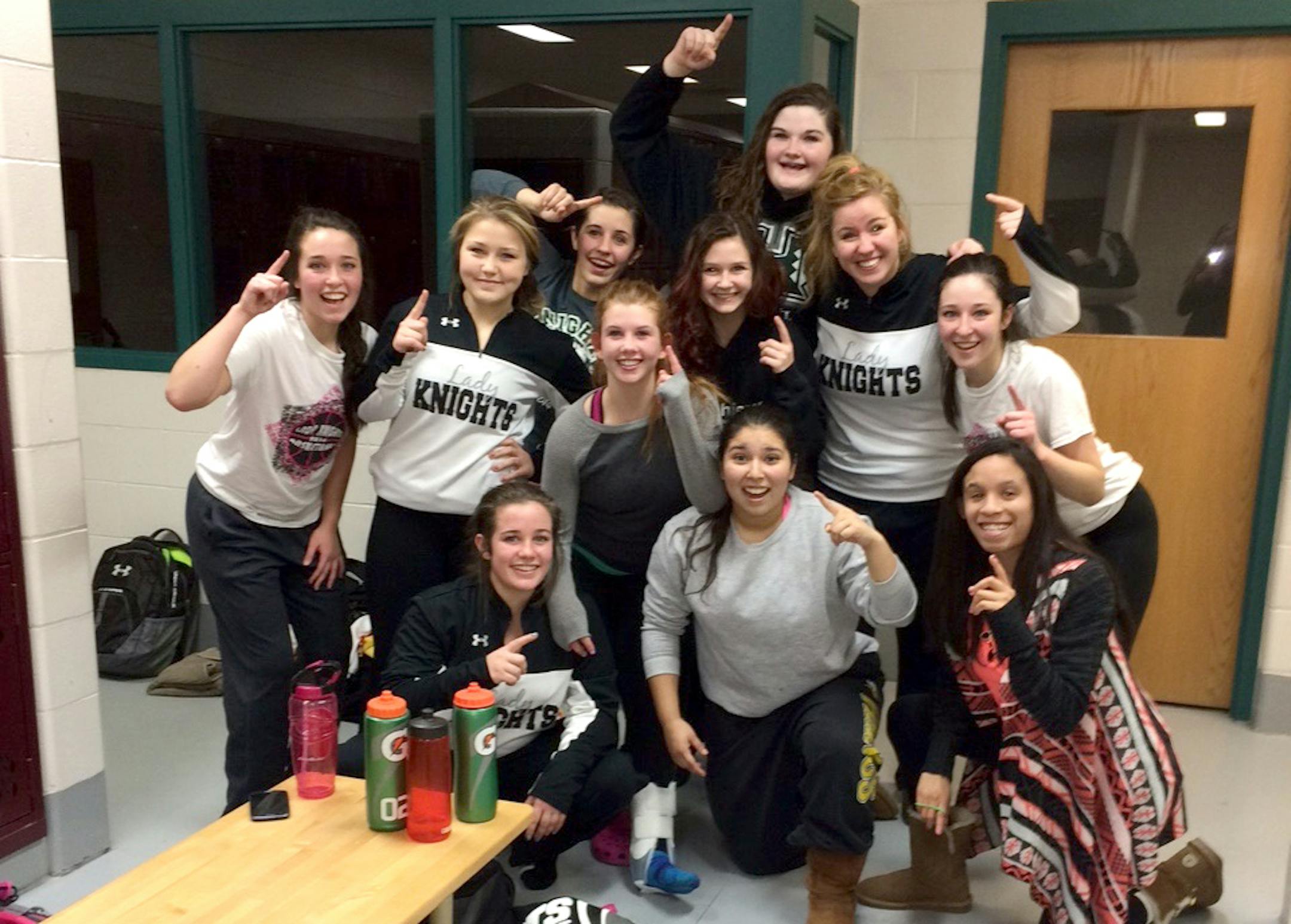 Picture of the jubilant Climax-Fisher girls' basketball team after ending their 84-game losing streak.