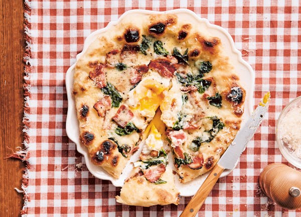 From "Pizza Night: 60+ Recipes for Date Nights, Lazy Nights and Party Nights" by Deborah Kaloper (Smith Street, 2023). The Breakfast