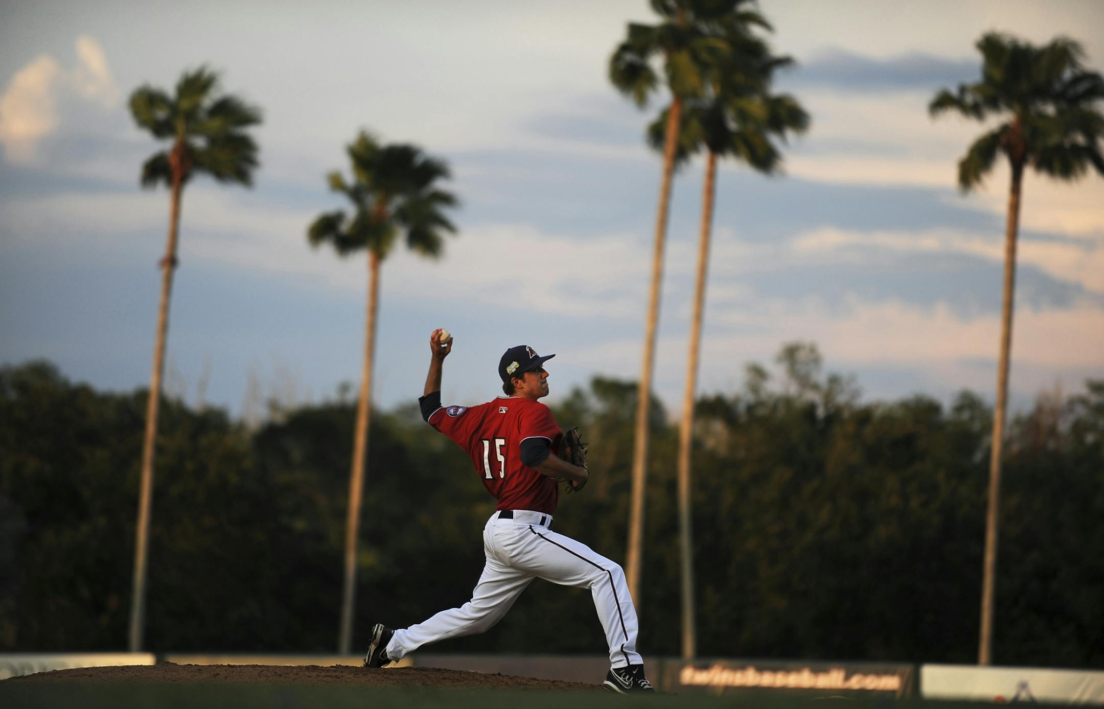 Fort Myers Miracle lefthander Pat Dean delivered a pitch in the fading light.