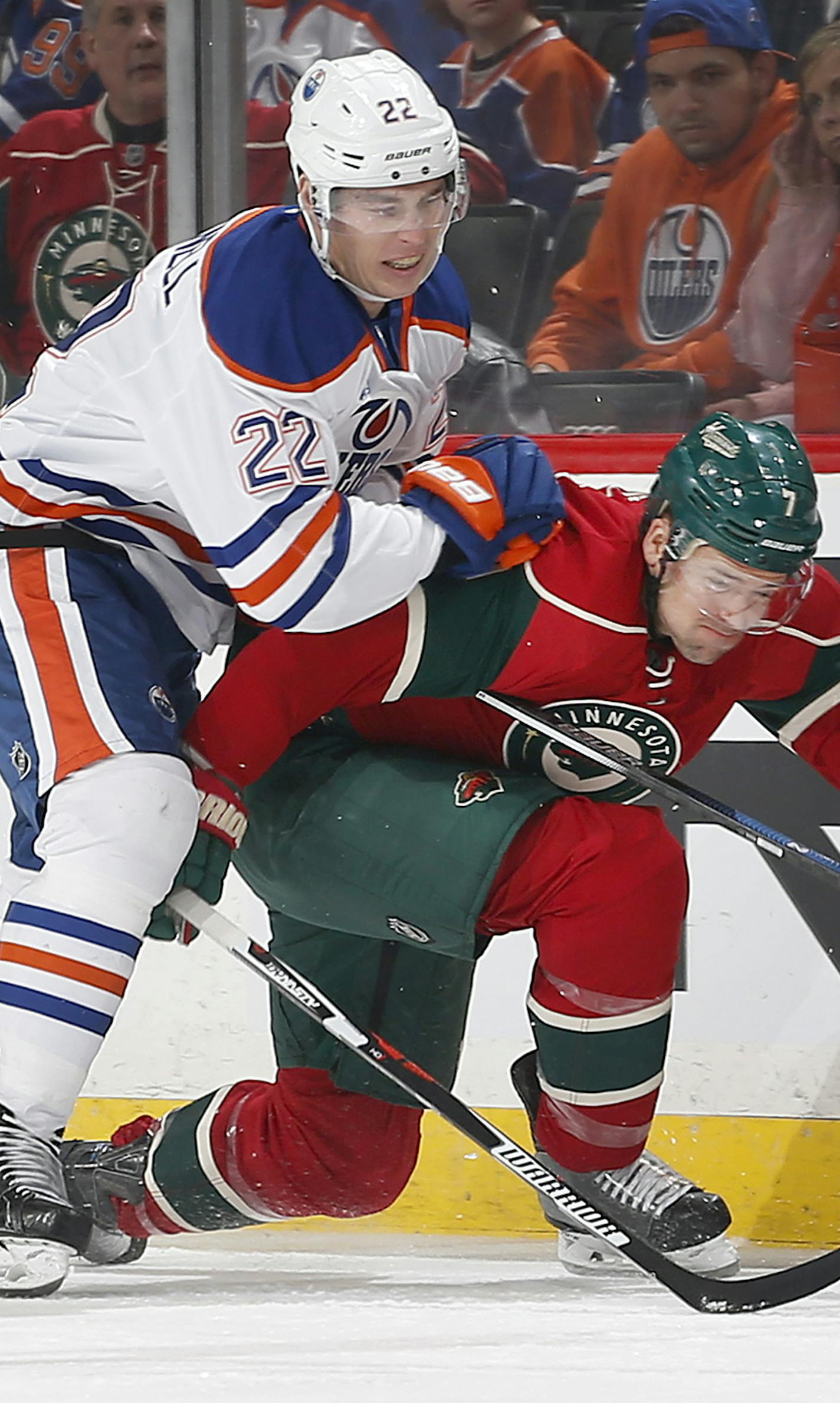 Adam Cracknell (22) and Chris Porter collided in the first period. ] CARLOS GONZALEZ cgonzalez@startribune.com - March 10, 2016, St. Paul, MN, Xcel Energy Center, NHL, Minnesota Wild vs.