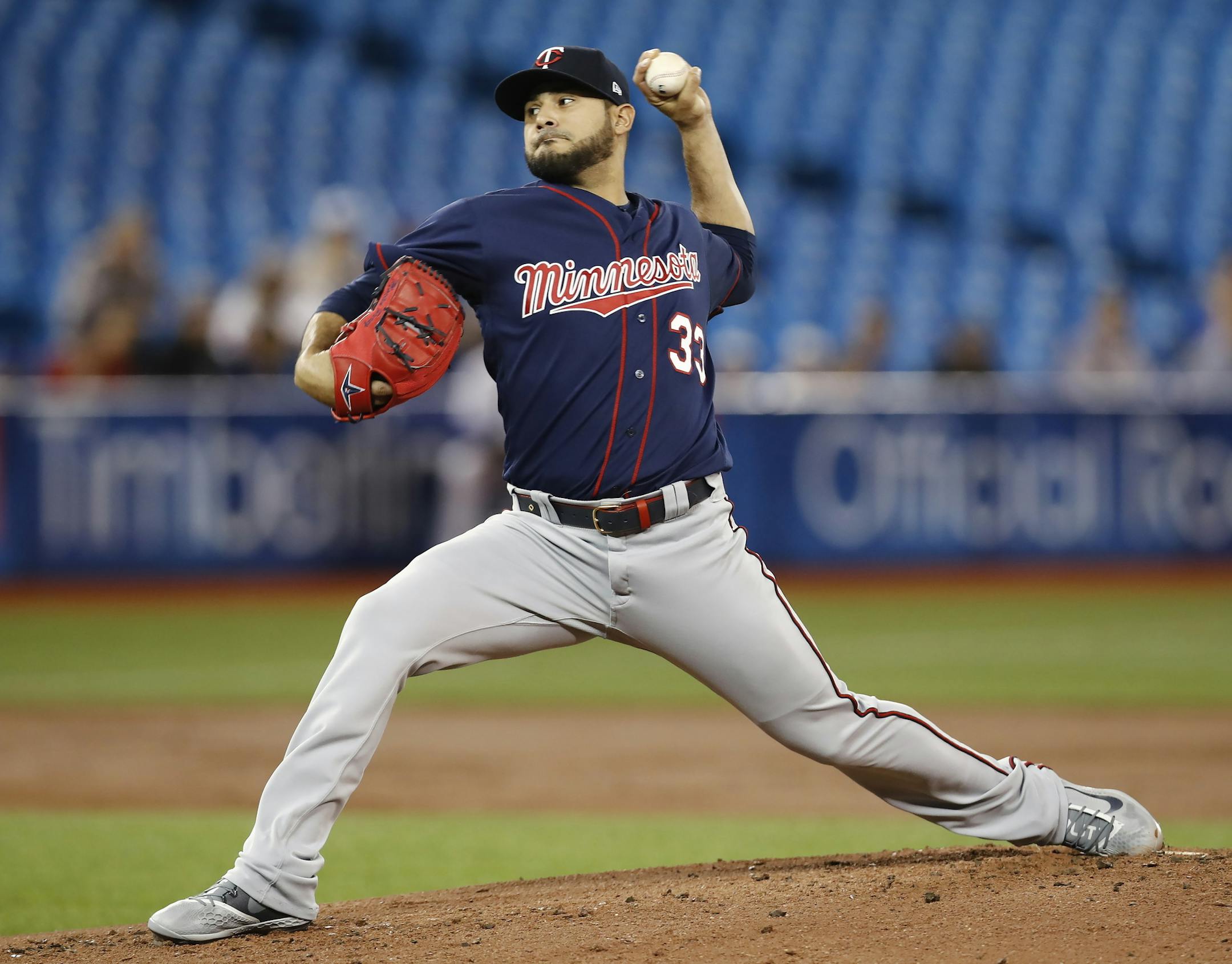 Minnesota Twins starting pitcher Martin Perez delivers to home plate during the first inning of baseball game action against the Toronto Blue Jays in Toronto, Monday, May 6, 2019. (Mark Blinch/The Canadian Press via AP)