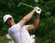 Spinal fusion surgery helped Tiger Woods collect another Masters golf championship last month.