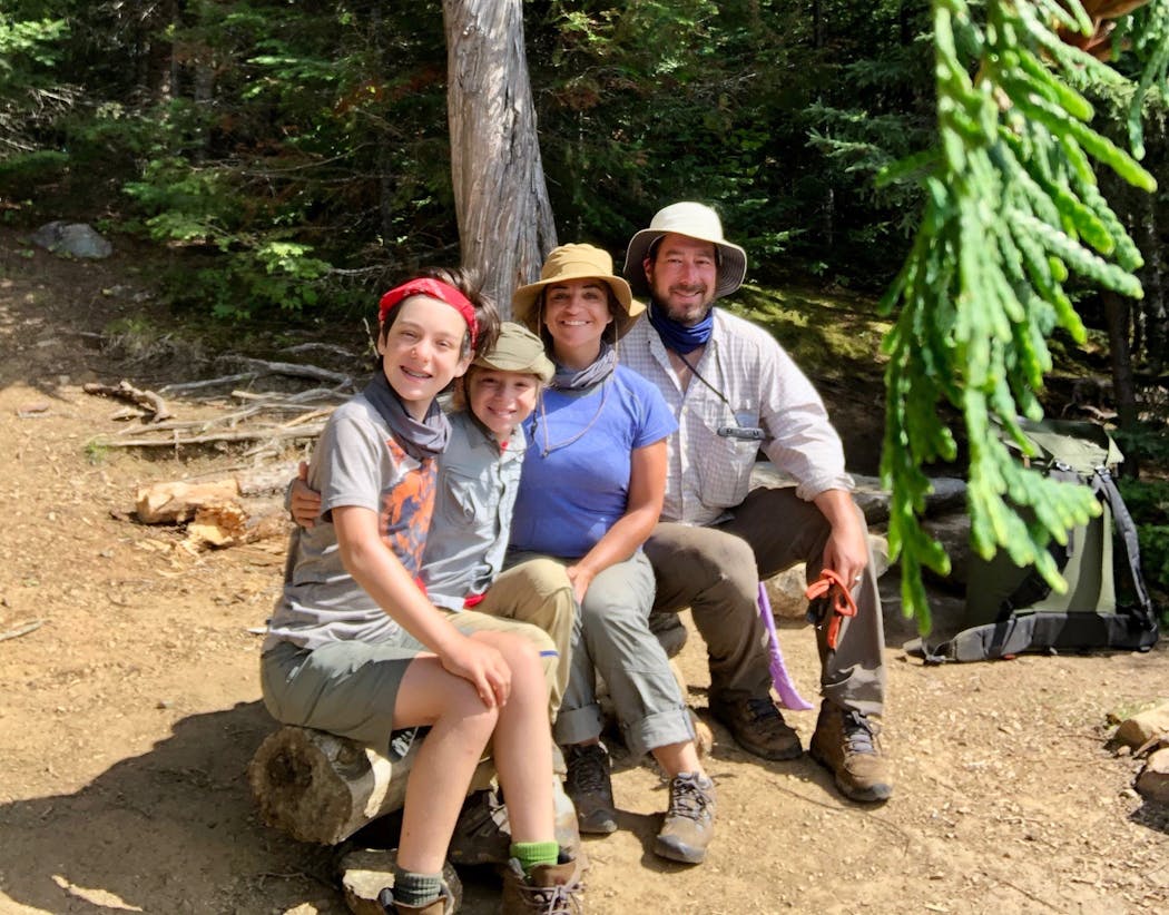 Jeff Heftman, right, took his family back to a place of youth: the Boundary Waters Canoe Area Wilderness. From left, children Nathan, Dalia and his wife, Michele.