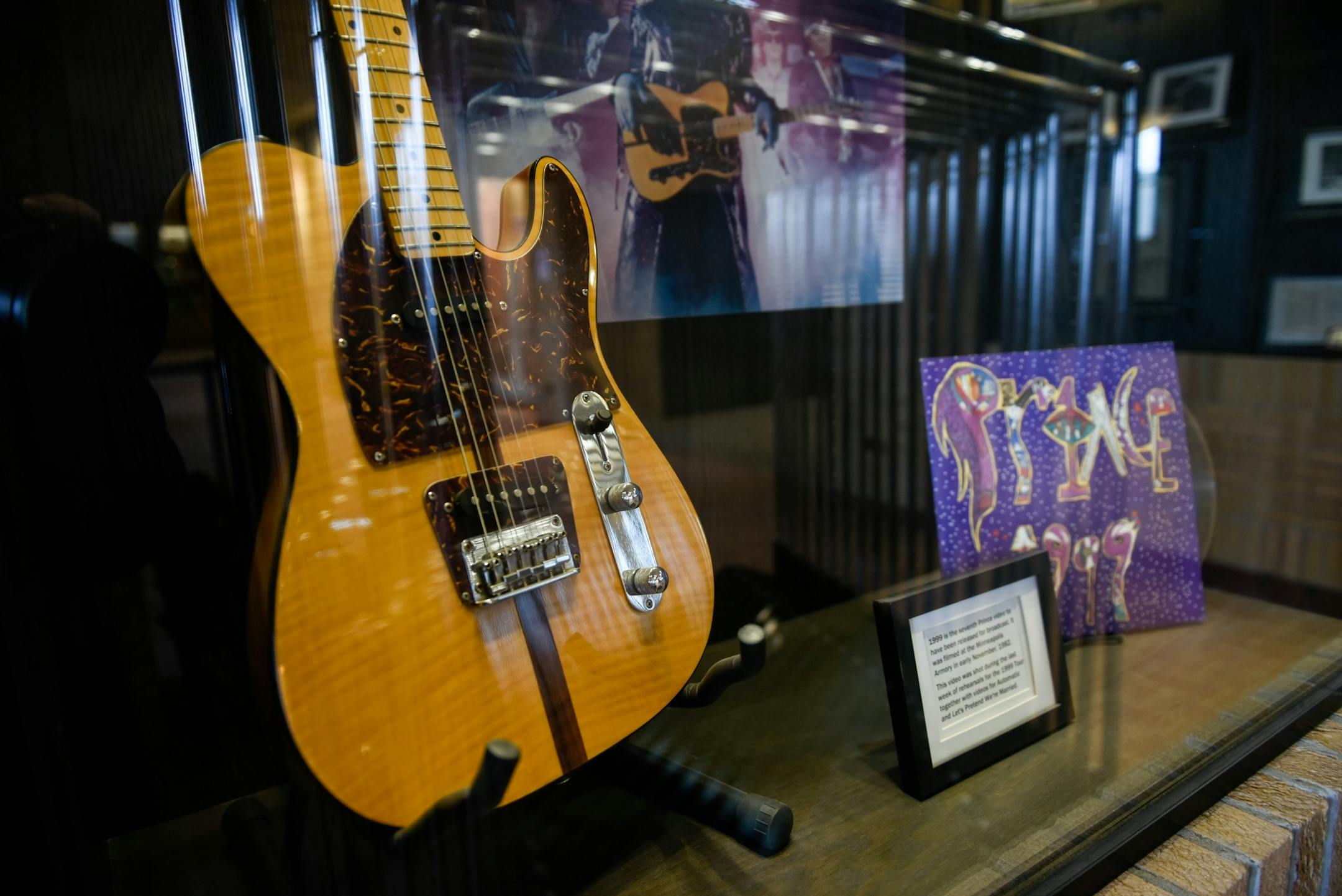 Prince's guitar, from the 1999 music video shot at the Armory, currently on display in the Armory's lobby.