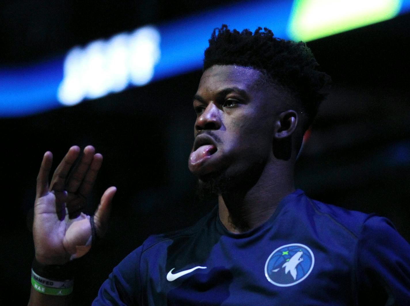 Minnesota Timberwolves guard Jimmy Butler reacts during player introductions before an NBA basketball game against the Brooklyn Nets, Saturday, Jan. 27, 2018, in Minneapolis. (AP Photo/Andy Clayton-King)