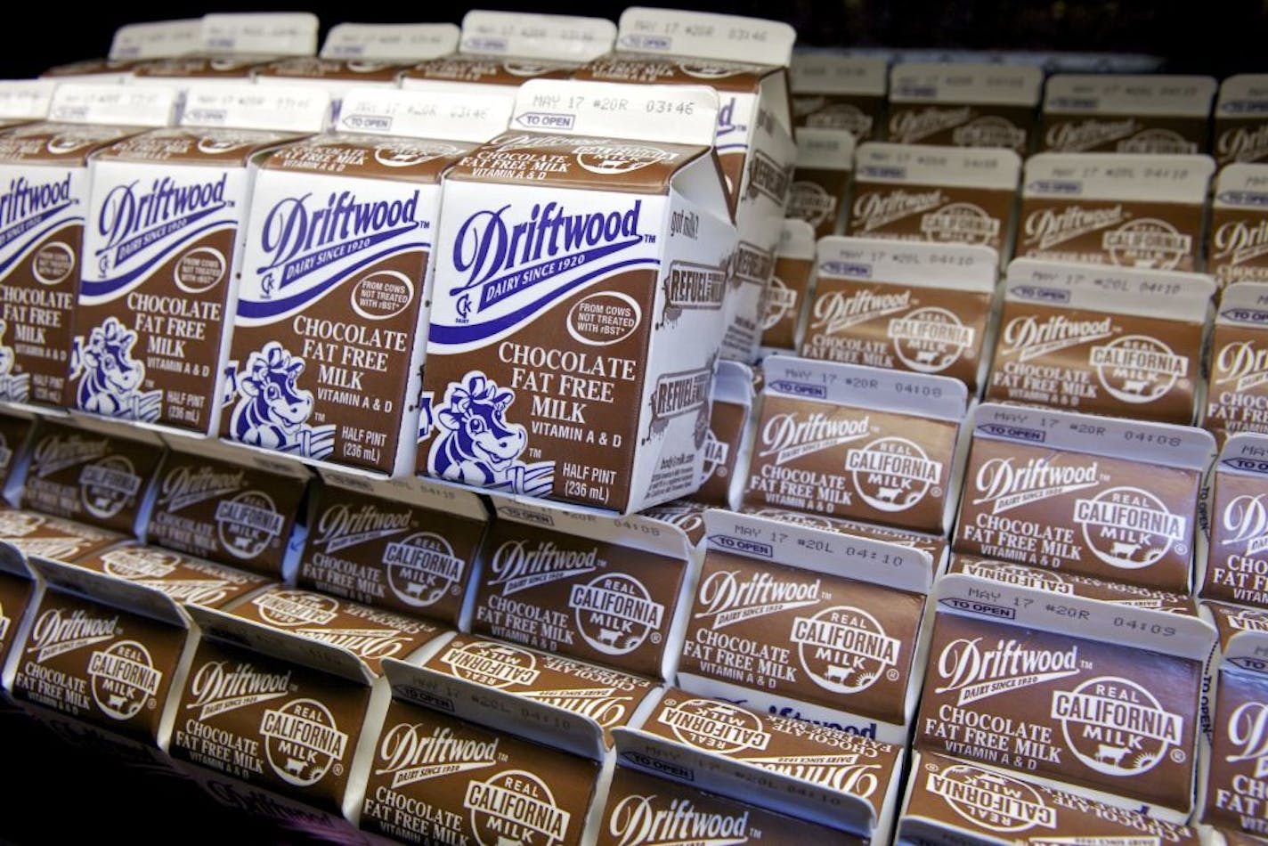 In this photo taken Tuesday, May 3, 2011, chocolate milk cartons are offered at the Belmont Senior High cafeteria in Los Angeles. With schools under increasing pressure to combat child obesity by offering healthier food, the national staple of kids� cafeteria trays has come under attack over the very ingredient that helps make it so popular, sugar.