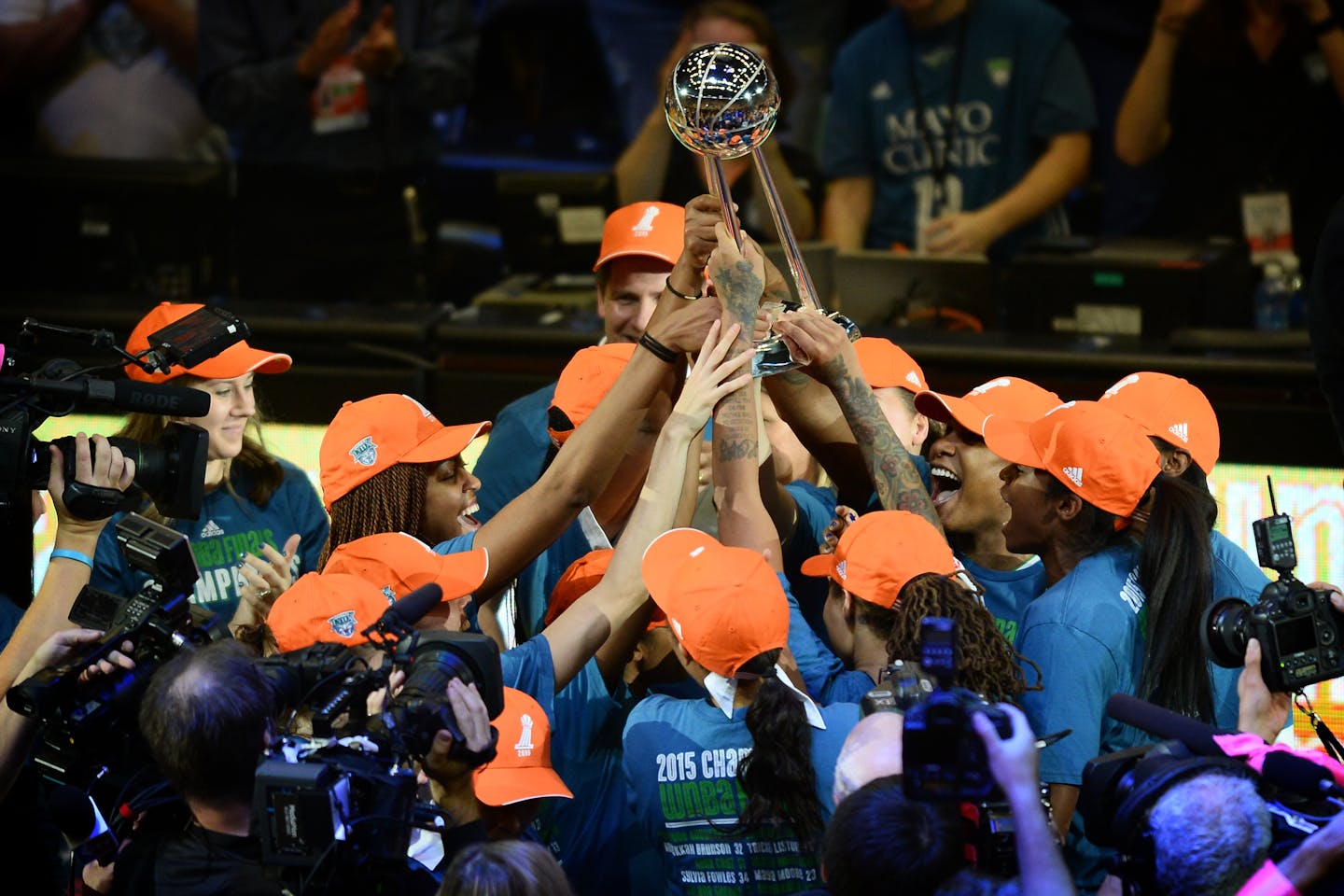 The Minnesota Lynx celebrated with their championship trophy after a 69-52 victory over the Indiana Fever in Game 5 of the WNBA Finals.