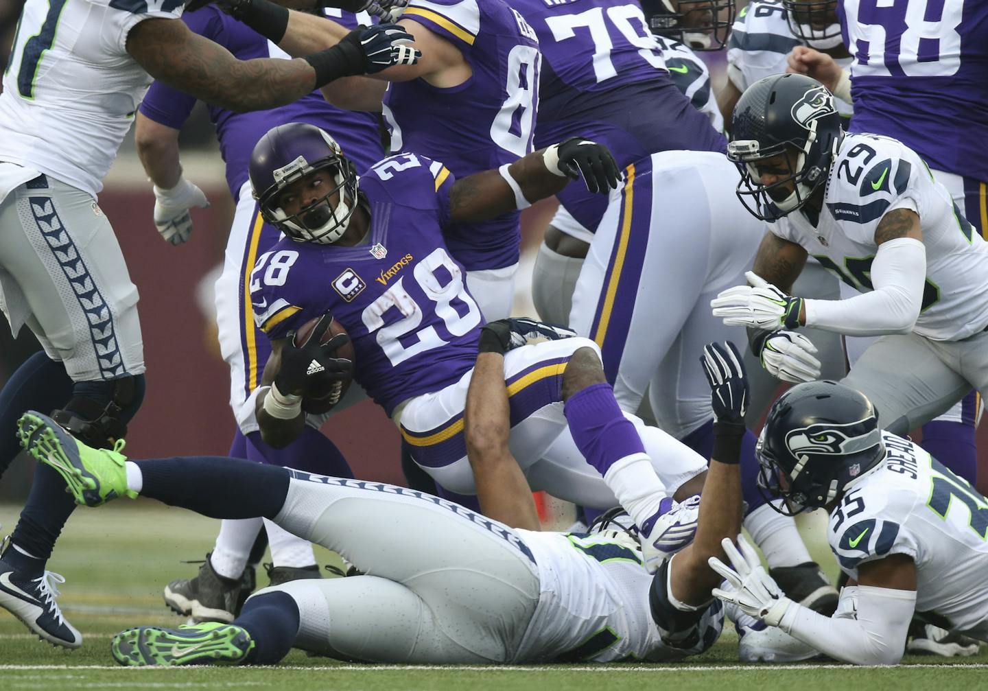 Vikings running back Adrian Peterson (28) was stopped after he gained four yards on a first quarter run Sunday. ] JEFF WHEELER &#xef; jeff.wheeler@startribune.com The Minnesota Vikings faced the Seattle Seahawks in an NFL football game Sunday afternoon, December 6, 2015 at TCF Bank Stadium in Minneapolis.