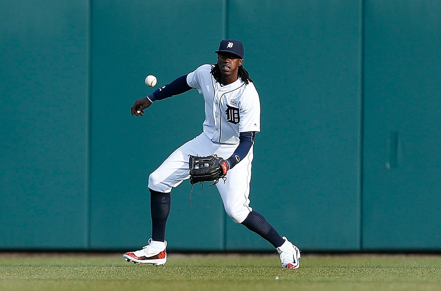 Detroit Tigers center fielder Cameron Maybin watches a Minnesota Twins' Eduardo Nunez (9) single land in front of him in the first inning of a baseball game, Monday, May 16, 2016 in Detroit.