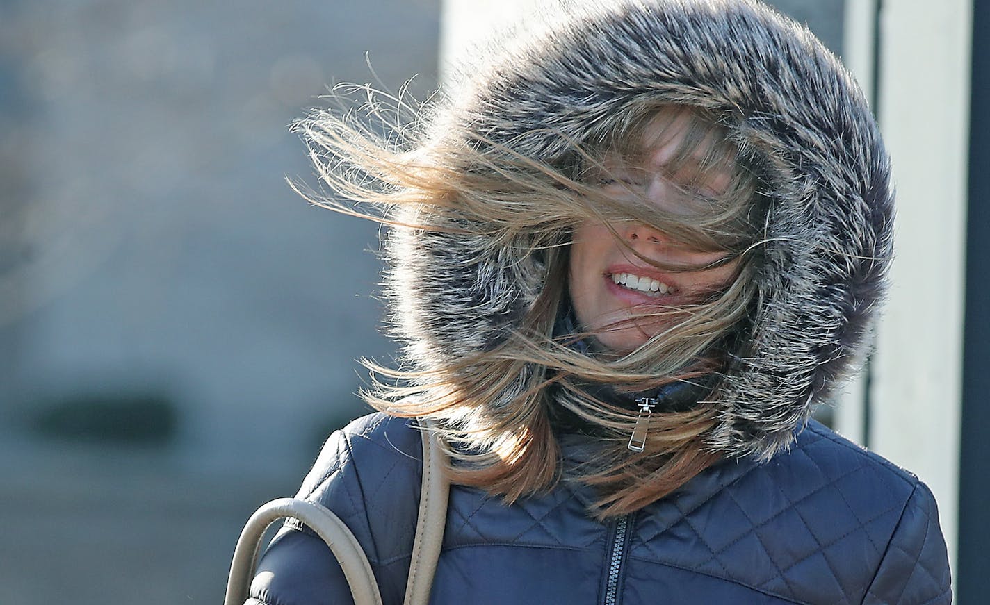 Robin Turnblom walked to work at the State Capitol from downtown St. Paul on Wednesday morning despite high winds.