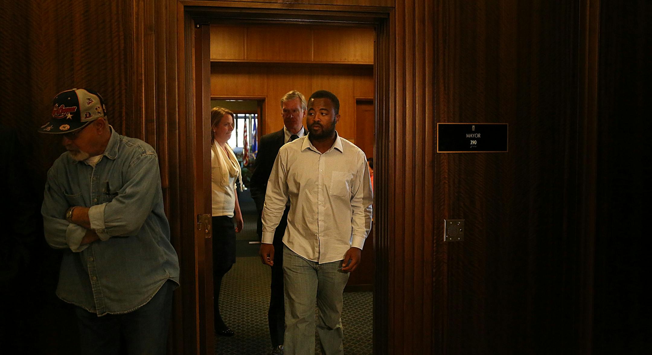 Rashad Turner, the leader of the St. Paul Black Lives Matter group, and St. Paul Mayor Chris Coleman emerged from Coleman�s office after meeting Thursday morning.