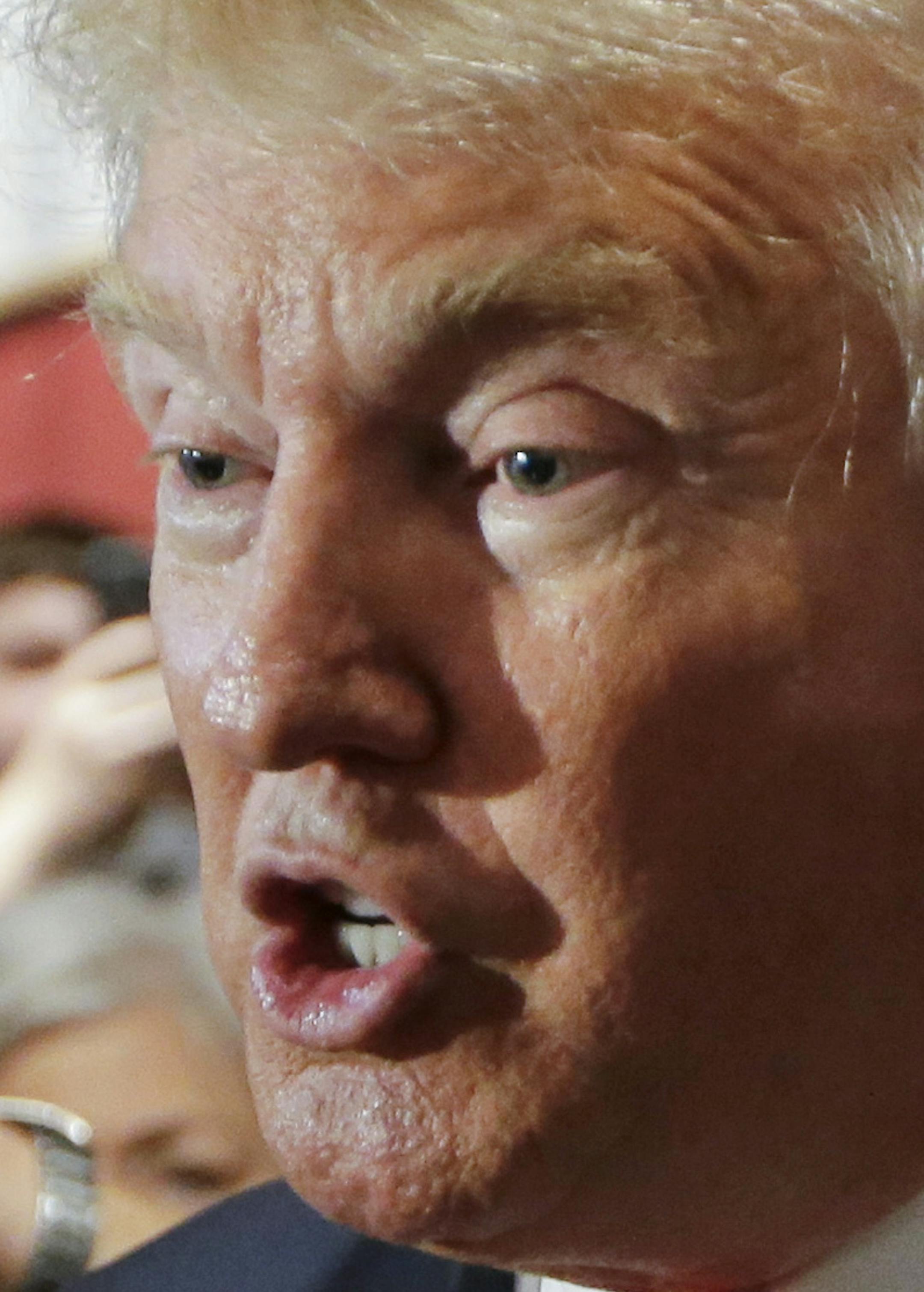 FILE - In this Aug. 29, 2015, file photo, Republican presidential candidate Donald Trump answers questions from reporters at the National Federation of Republican Assemblies in Nashville, Tenn. Lobbing rhetorical stink bombs at a large group of voters is not the normal way to get ahead in U.S. politics. Nor is alienating prominent figures of your own party. But Donald Trump has turned the do’s and don’ts of campaigns on their head, prospering with tactics that could sink anyone els
