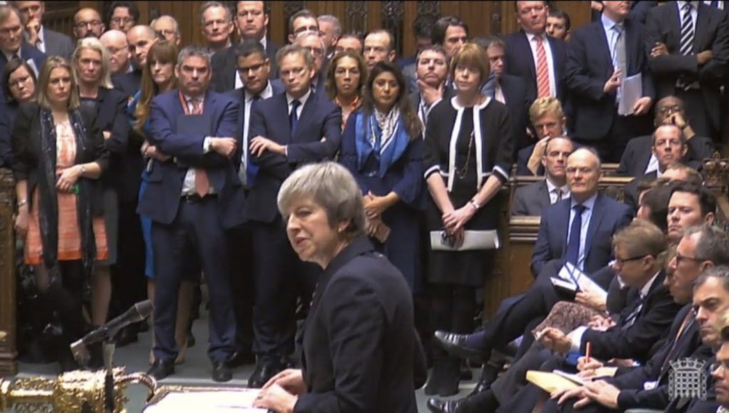 In this grab taken from video, Britain's Prime Minister Theresa May makes a statement in the House of Commons, in London, Monday, Dec. 10, 2018. May has postponed Parliament's vote on her European Union divorce deal to avoid a shattering defeat _ a decision that throws her Brexit plans into chaos.