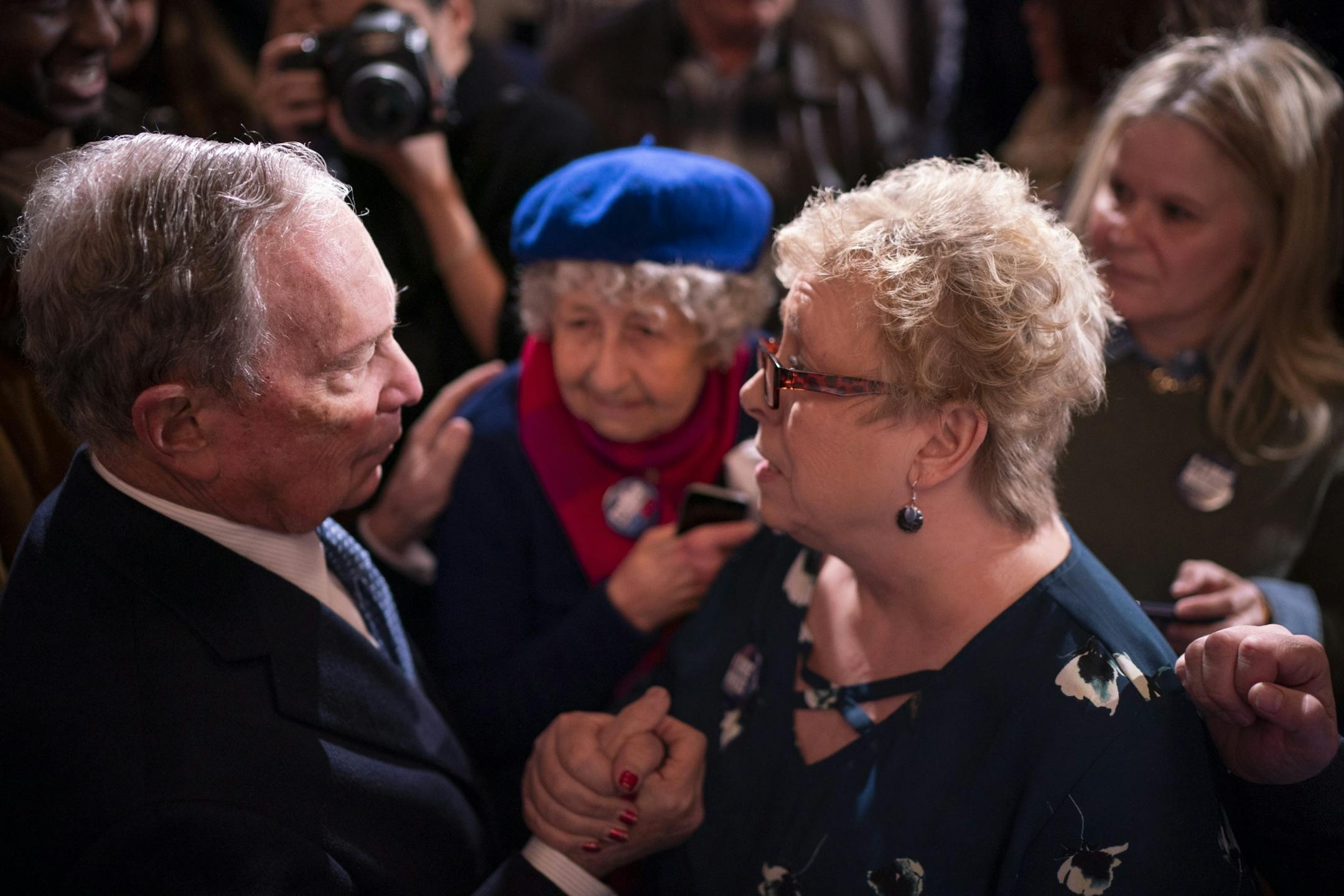 Democratic presidential candidate Michael Bloomberg spoke with Sheri Schmaus after making remarks at an event to open his first campaign office in the state. Between them was Stephanie Digby.