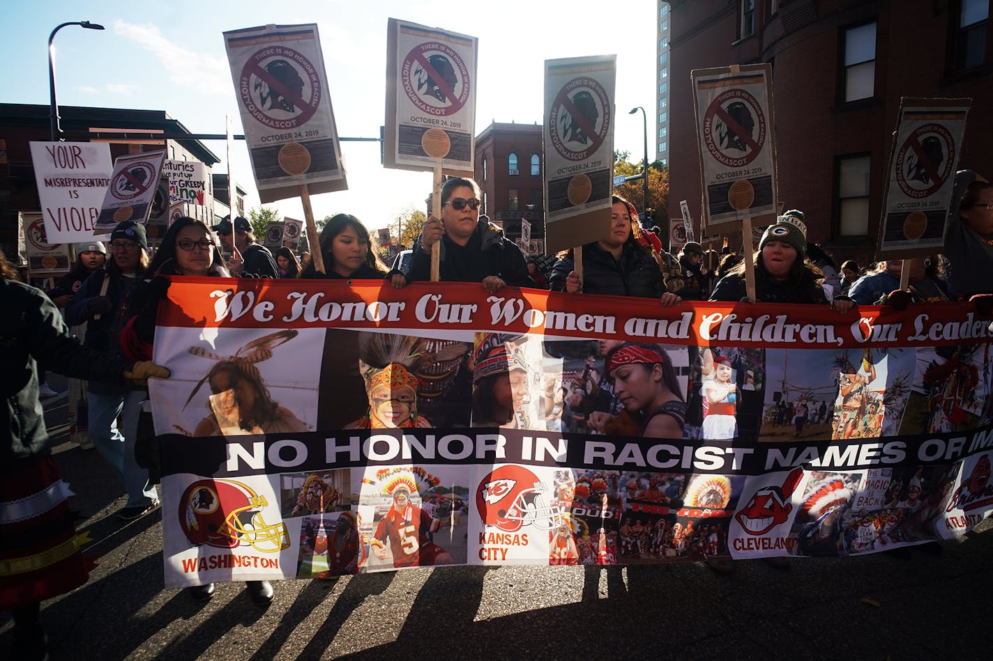 Protesters marched from Peavey Park to U.S. Bank Stadium to protest the use of the nickname used by Washington's NFL team, which is playing the Vikings tonight.