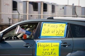 Patty Keeling, vice president of the Asamblea de Derechos Civiles, led chants outside the Pilgrim’s Pride plant on May 11 in Cold Spring, Minn. J