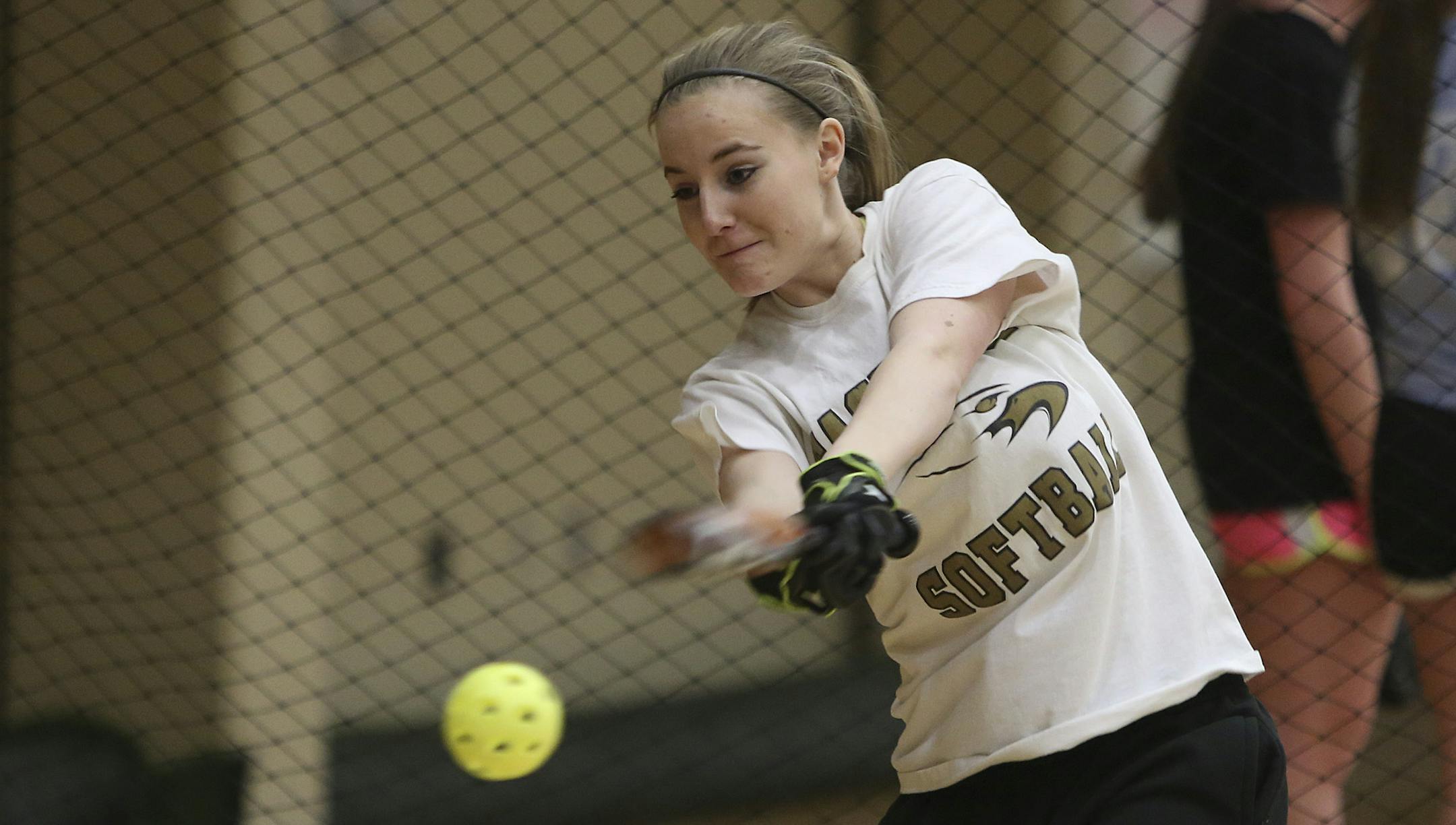 Tori Ostman worked her push bunting during softball practice at the East Ridge High School in Woodbury, Min., Tuesday, March 26, 2013. ] (KYNDELL HARKNESS/STAR TRIBUNE) kyndell.harkness@startribune.com