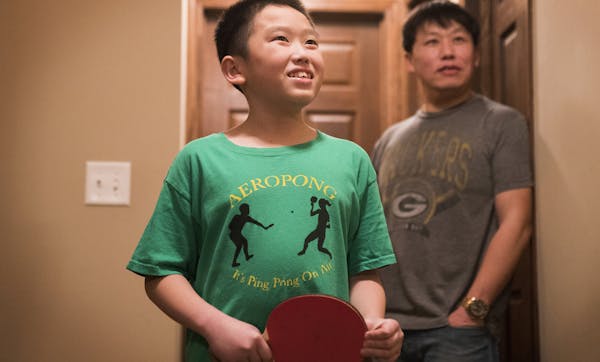 Kusa Xiong talks about Aeropong while his father Long Xiong stands behind him. ] LEILA NAVIDI &#xef; leila.navidi@startribune.com BACKGROUND INFORMATI