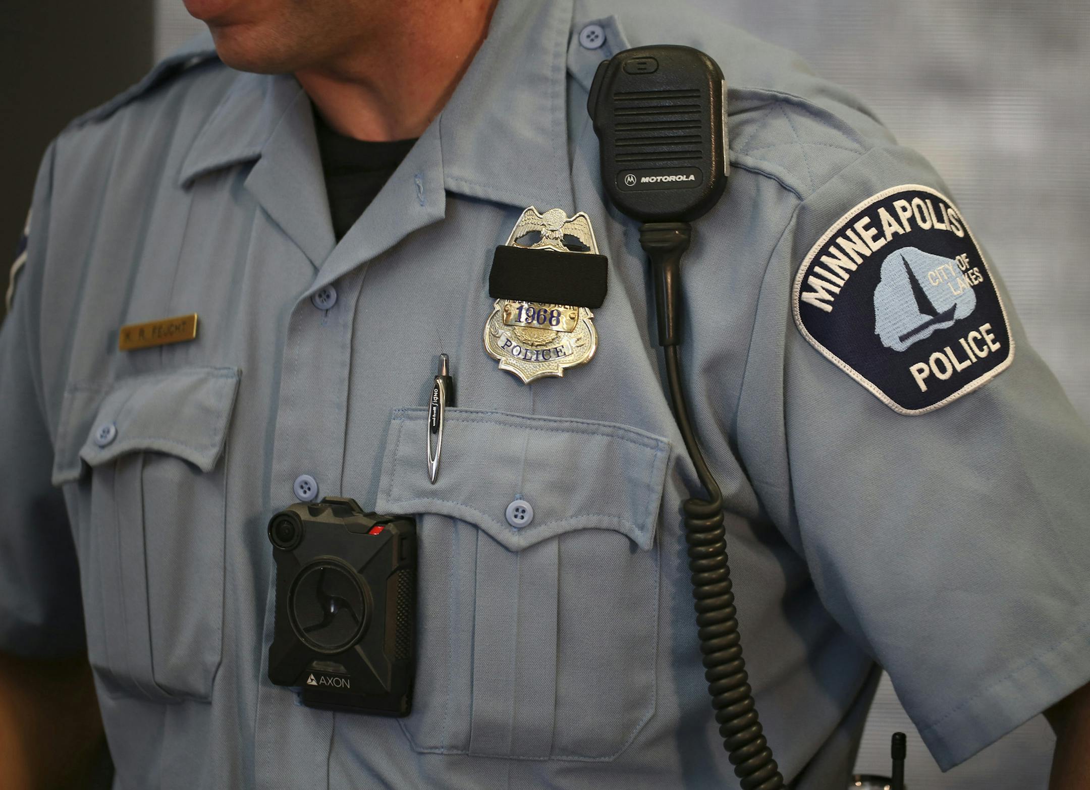 Minneapolis Police Officer Ken Feucht was one of the officers who volunteered for the body camera pilot program. He wore the Axon camera, made by Taser that will be used by the Minneapolis Police Department at the news conference at the First Precinct Police Headquarters Tuesday afternoon. ] JEFF WHEELER &#x2022; jeff.wheeler@startribune.com Mayor Betsy Hodges and Police Chief Jane Harteau announced at a news conference Tuesday afternoon, July 19, 2016 that Minneapolis Police Department's Body C