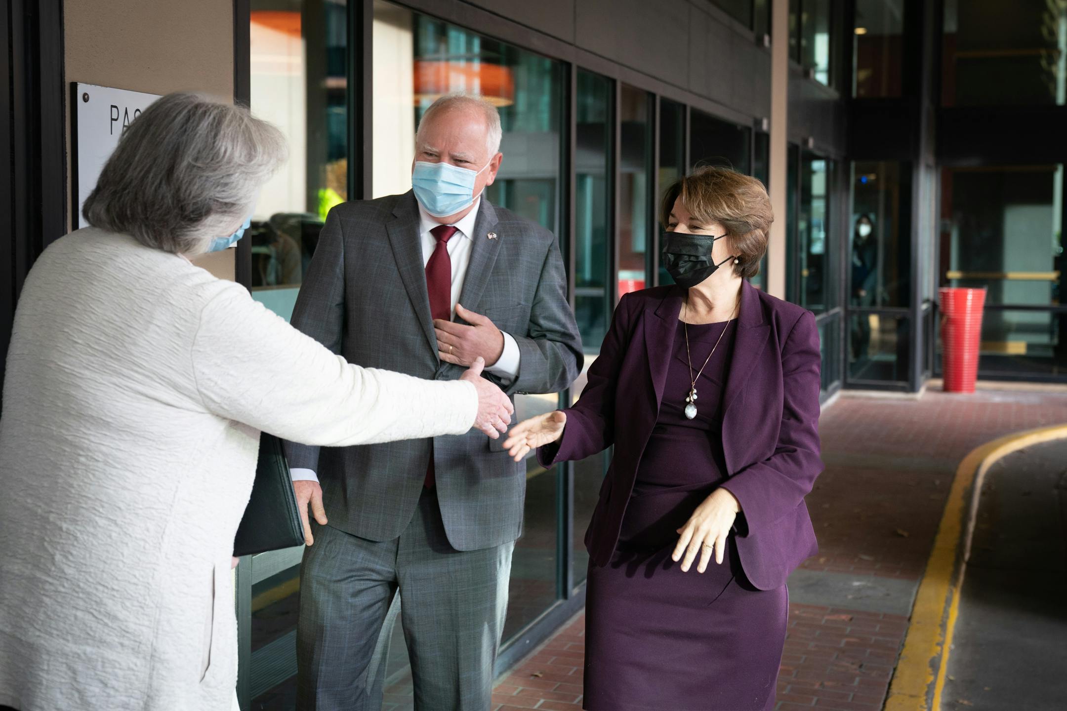 As they waited for Department of Health and Human Services HHS Secretary Xavier Becerra at Mayo Clinic, Minnesota Health Commissioner Jan Malcom, greeted U.S. Sen. Amy Klobuchar, Wednesday, Nov. 10, 2021, in Rochester, Minn. along with Minnesota Gov. Tim Walz. Becerra traveled to Minnesota to encourage pediatric vaccinations and highlight the Biden-Harris Administration's plans to build back better through investments in affordable drug prices. ] GLEN STUBBE • glen.stubbe@startribune.com