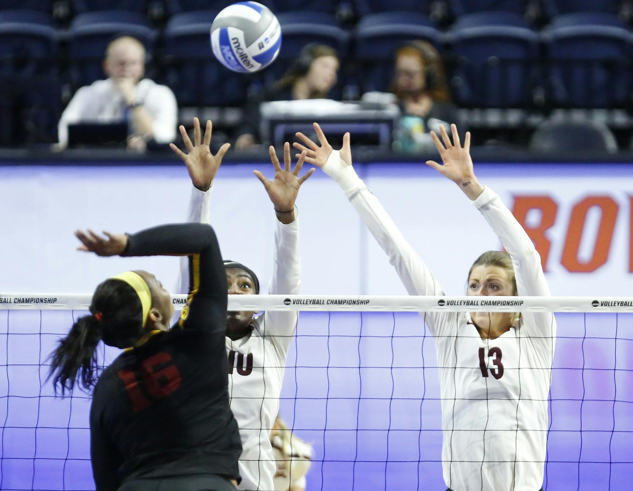Minnesota Gophers' Stephanie Samedy (10) and Molly Lohman (13) go up for a block during the Regional Semi-Final match against USC in the NCAA Volleyball Championships at the O'Connell Center in Gainesville Friday Dec. 8, 2017. The Gophers lost in straight sets 3-0 to the Trojans. [Brad McClenny/The Gainesville Sun]