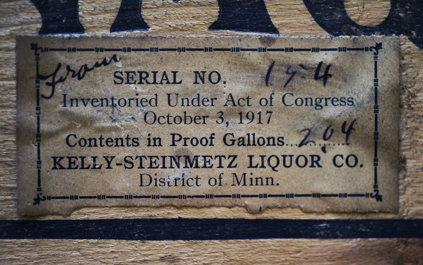 A very old label from a wooden case that contained bottles of Tanager Dry Gin.