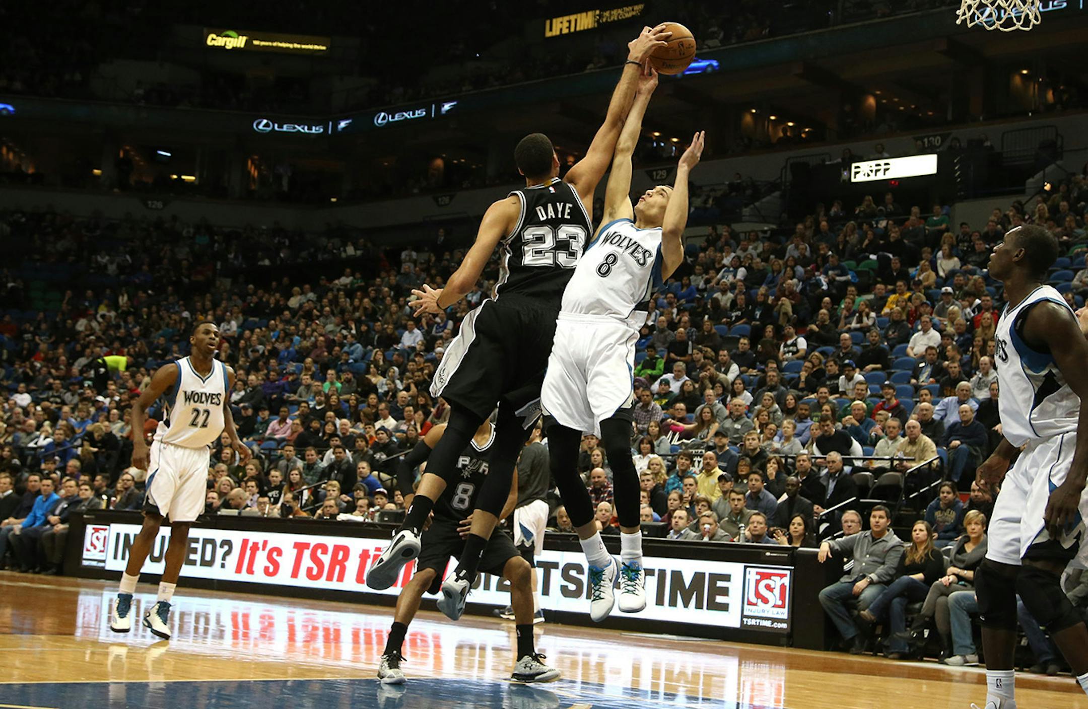 The Spurs Austin Daye knocked the ball out of the hands of Wolves Zach LaVine dunked during the first half. ] (KYNDELL HARKNESS/STAR TRIBUNE) kyndell.harkness@startribune.com Timberwolves vs San Antonio at the Target Center in Minneapolis Min., Saturday, January 10, 2014.