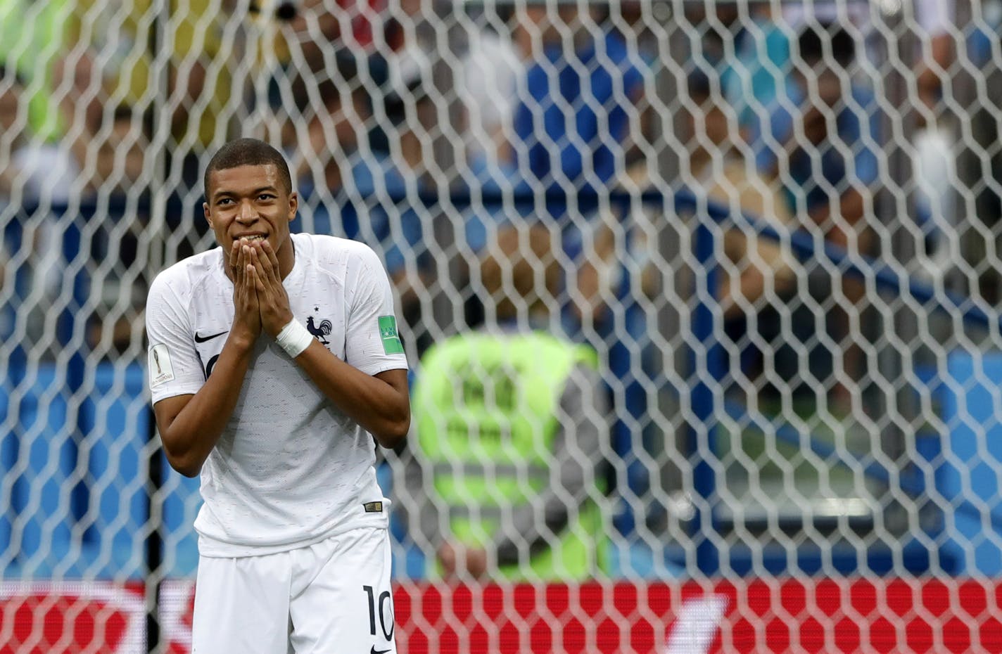 France's Kylian Mbappe reacts after missing a chance to score during the quarterfinal match between Uruguay and France at the 2018 soccer World Cup in the Nizhny Novgorod Stadium, in Nizhny Novgorod, Russia, Friday, July 6, 2018. (AP Photo/Ricardo Mazalan)