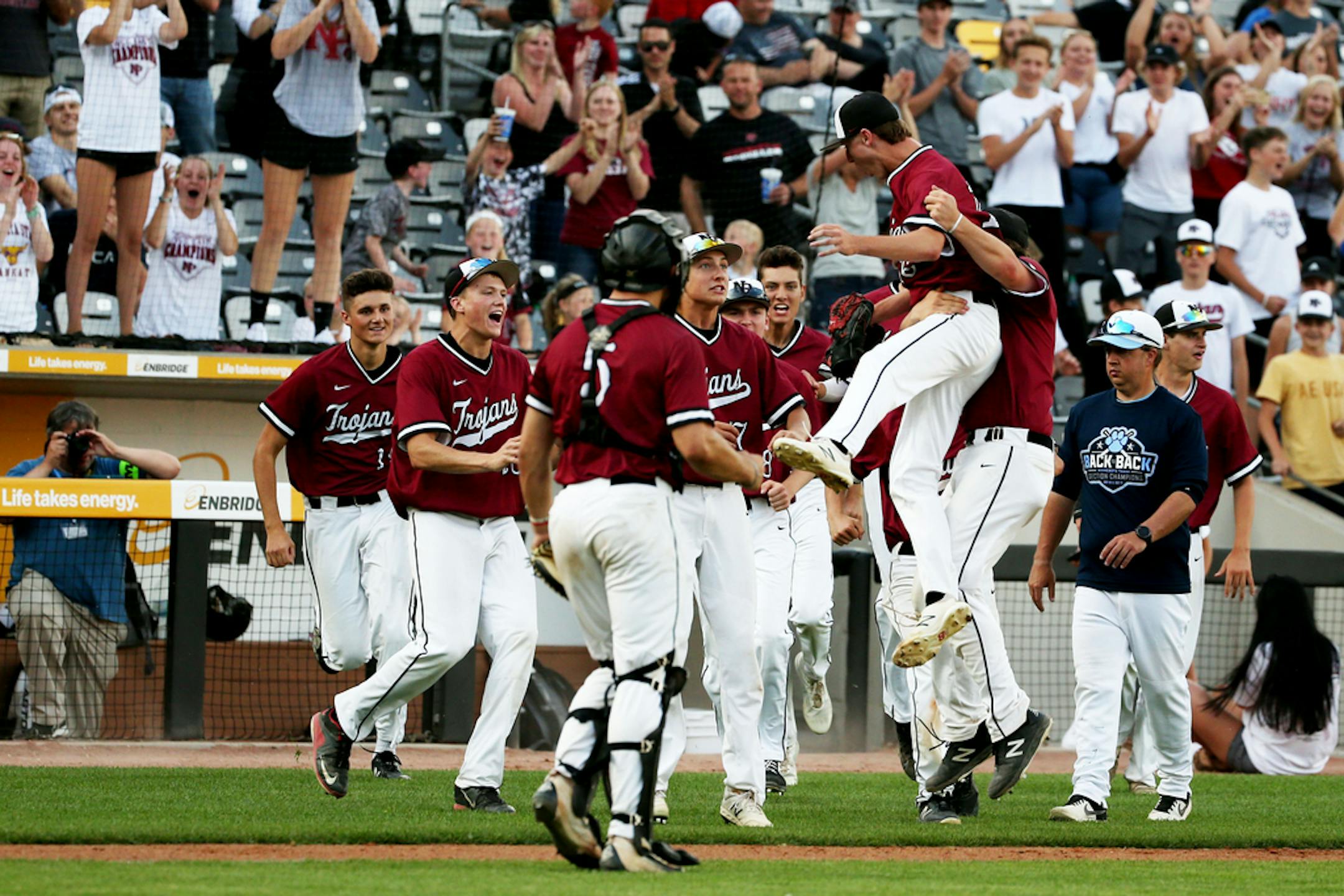 New Prague players celebrated in front of their fans at CHS Field last Friday after defeating Blaine in the Class 4A semifinals. Photo: NICOLE NERI • nicole.neri@startribune.com