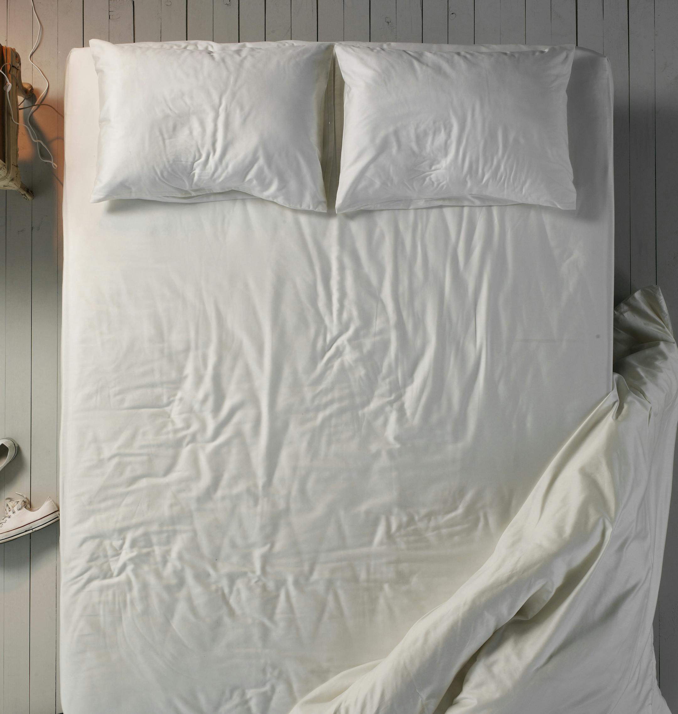 Looking over an unmade bed
istock