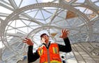 Standing inside near the top, NBBJ architect Dale Alberda, lead designer of the Amazon Spheres, describes the complex design of the three domes, on No