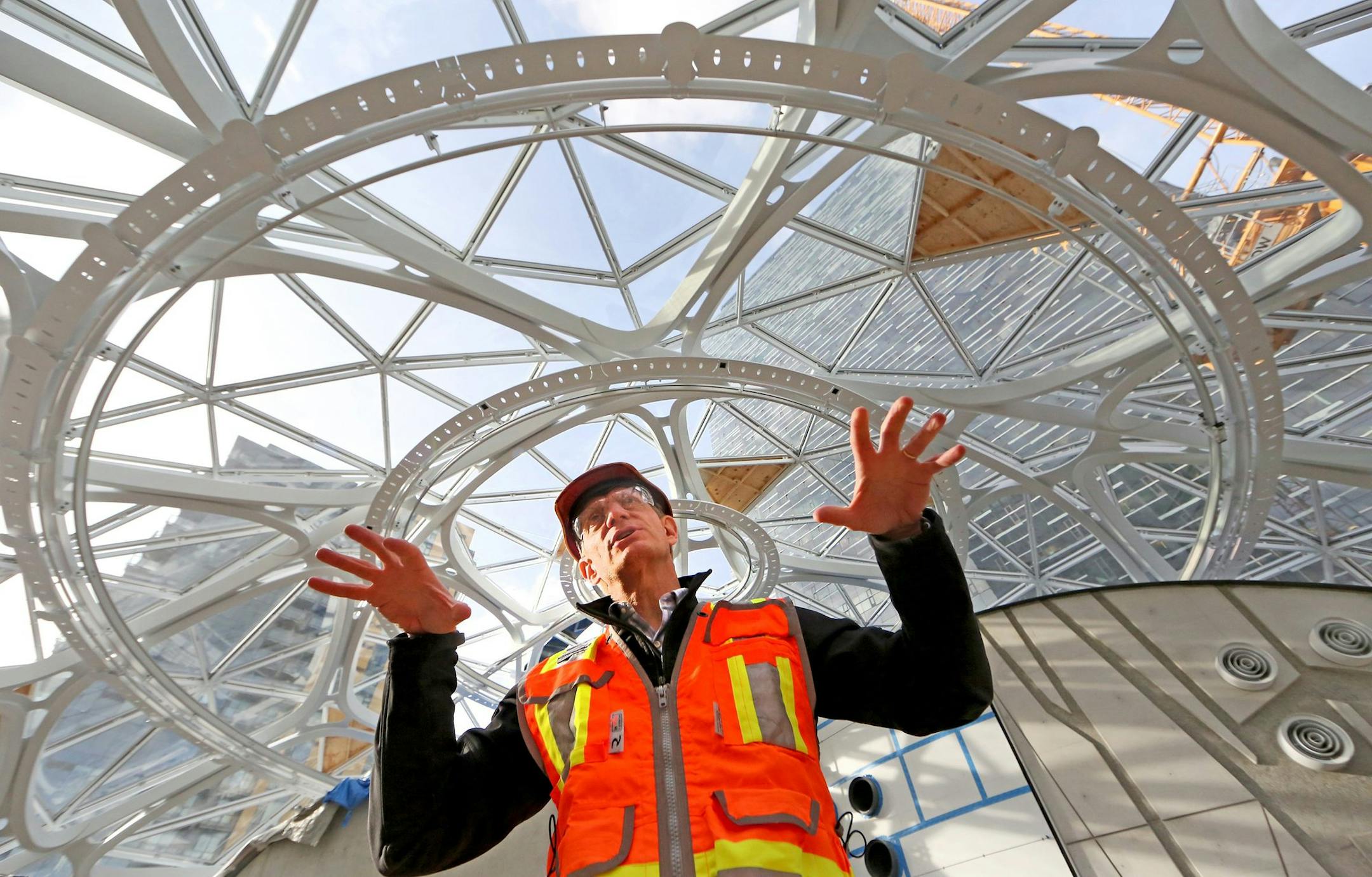 Standing inside near the top, NBBJ architect Dale Alberda, lead designer of the Amazon Spheres, describes the complex design of the three domes, on November 17, 2016. (Greg Gilbert/Seattle Times/TNS) ORG XMIT: 1195463