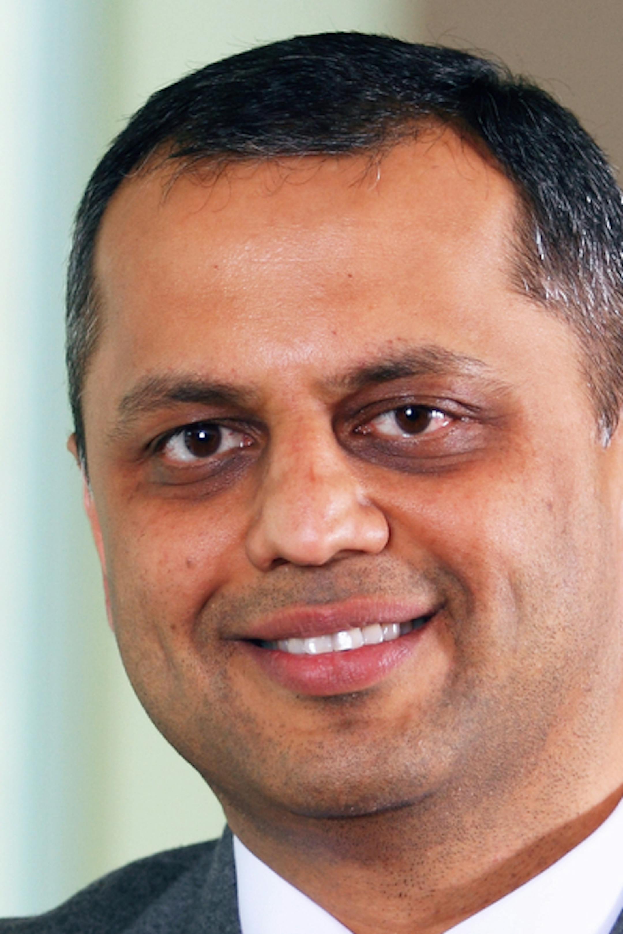 Environmental portrait of Avinash Malshe taken on Friday, April 12, 2013 on the Minneapolis campus of the University of St. Thomas.