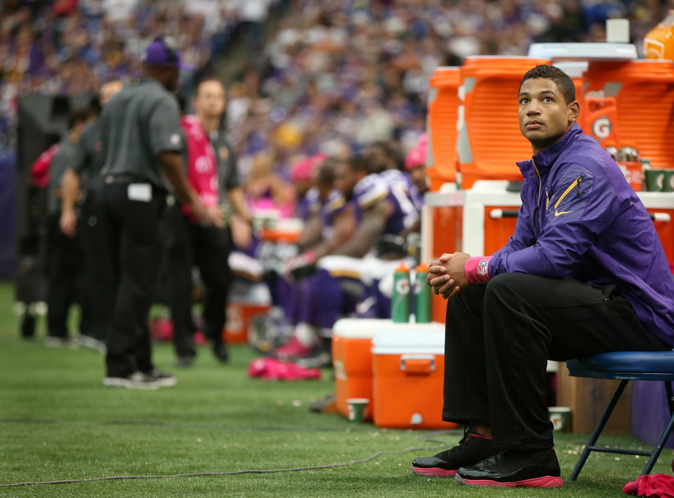 Vikings quarterback Josh Freeman looked at the video board to watch the team's 35-10 loss to the Carolina Panthers.