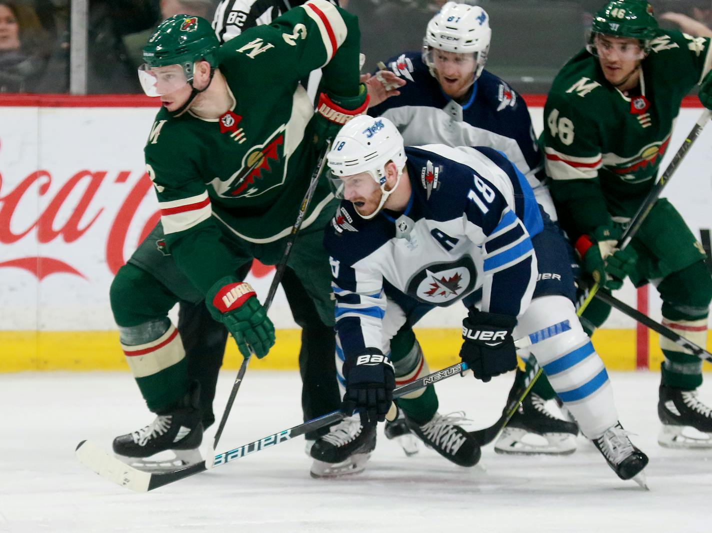 The Minnesota Wild's Charlie Coyle (3) and Winnipeg's Bryan Little (18) jostle during the second period of the Wild's 4-1 win over the Winnipeg Jets Saturday, Jan. 13, 2018, at the Xcel Energy Center in St. Paul, MN.] DAVID JOLES &#xef; david.joles@startribune.com Wild vs. Winnipeg Jets