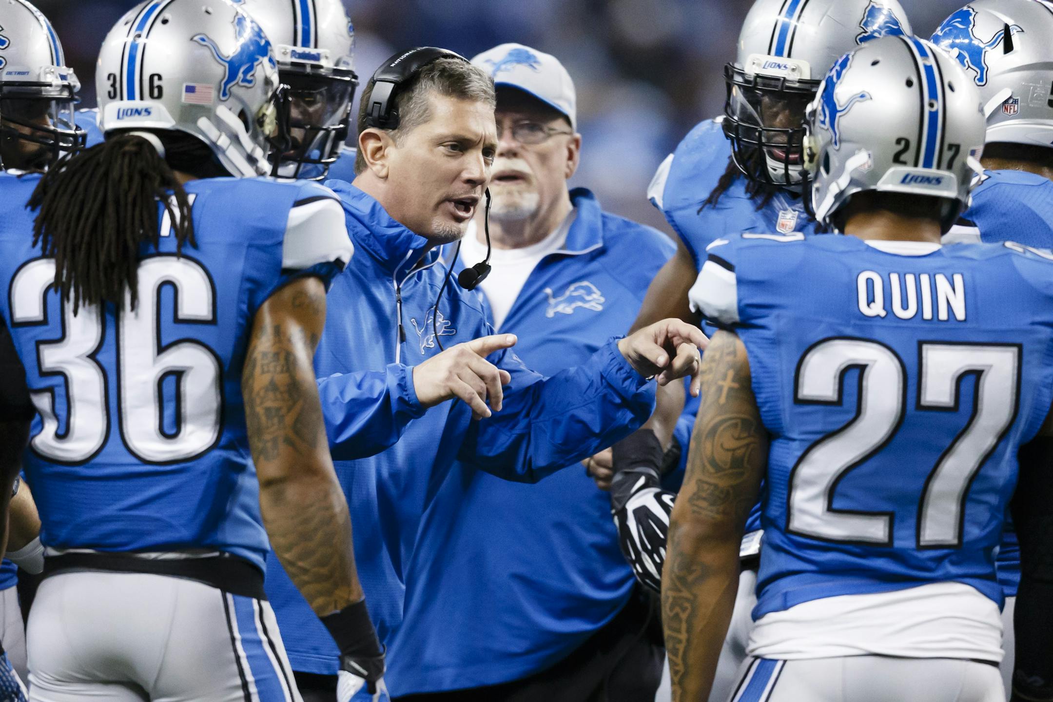 Detroit Lions head coach Jim Schwartz talks to his team during the second half of an NFL football game against the New York Giants in Detroit, Sunday, Dec. 22, 2013. (AP Photo/Rick Osentoski)