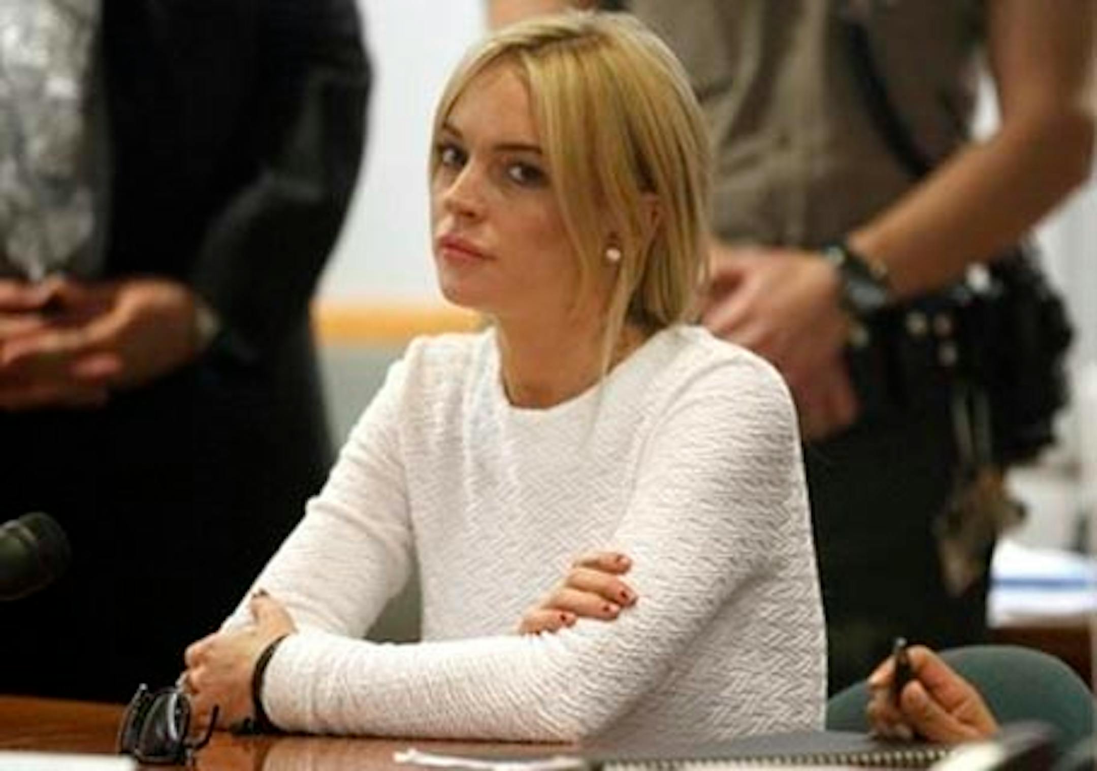 Actress Lindsay Lohan appears in court during her arraignment on a felony grand theft charge at the LAX Airport Courthouse in Los Angeles, Wednesday, Feb. 9, 2011. (AP Photo/Mario Anzuoni, Pool)