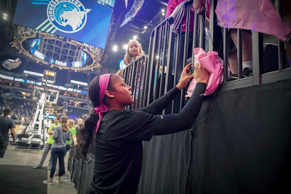Minnesota Lynx forward Maya Moore signed autographs for young fans before the Minnesota Lynx took on the Seattle Storm, at Target Center, Sunday, Augu