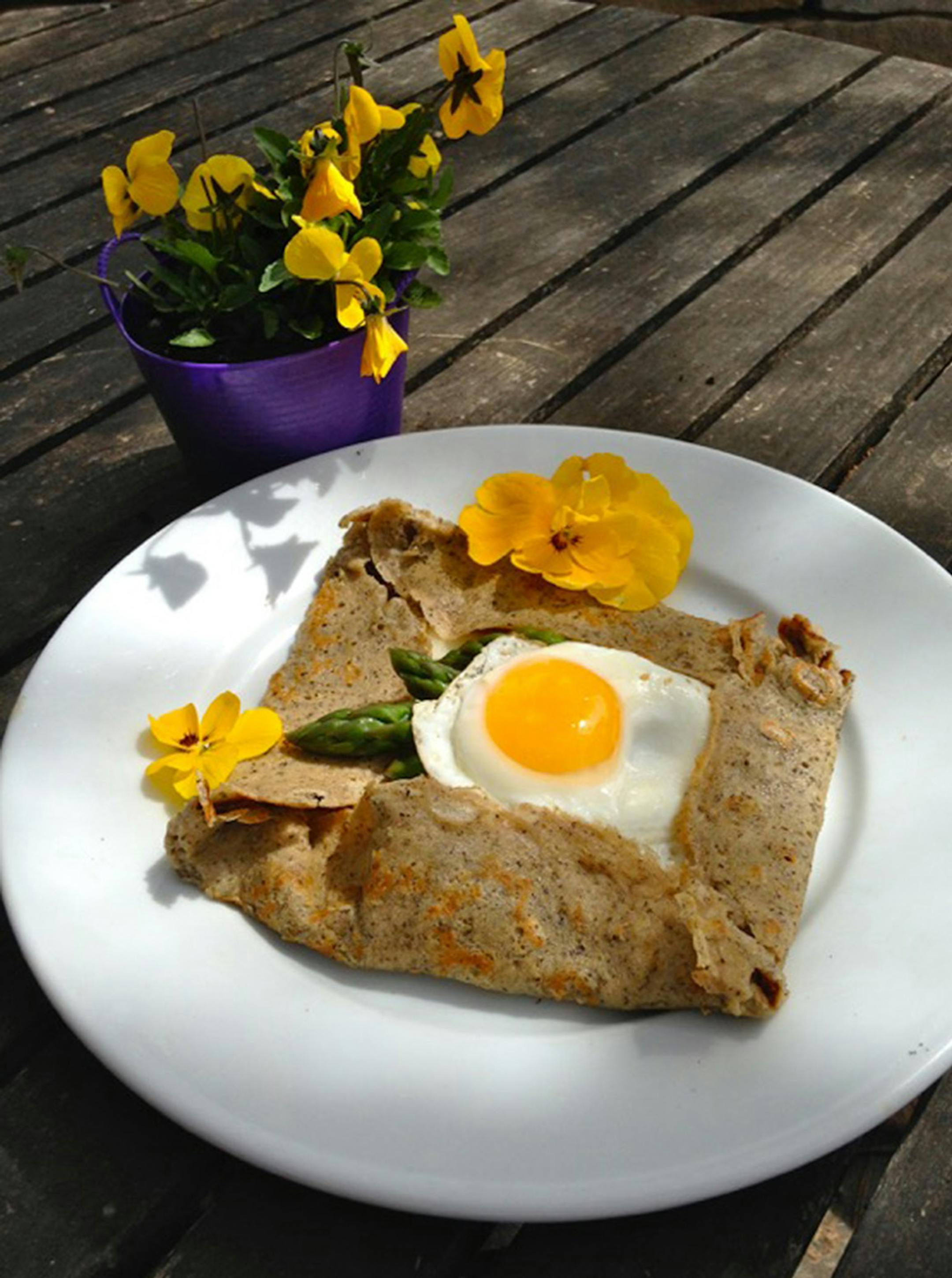 Credit: Nell Pierce Gallettes with steamed asparagus, Gruyere cheese and fried egg.