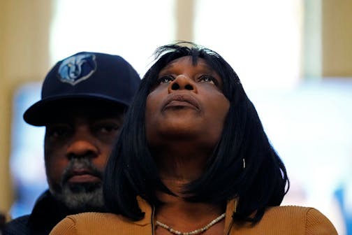 RowVaughn Wells, mother of Tyre Nichols, who died after being beaten by Memphis police officers, is comforted by Tyre's stepfather Rodney Wells, at a news conference with civil rights Attorney Ben Crump in Memphis.