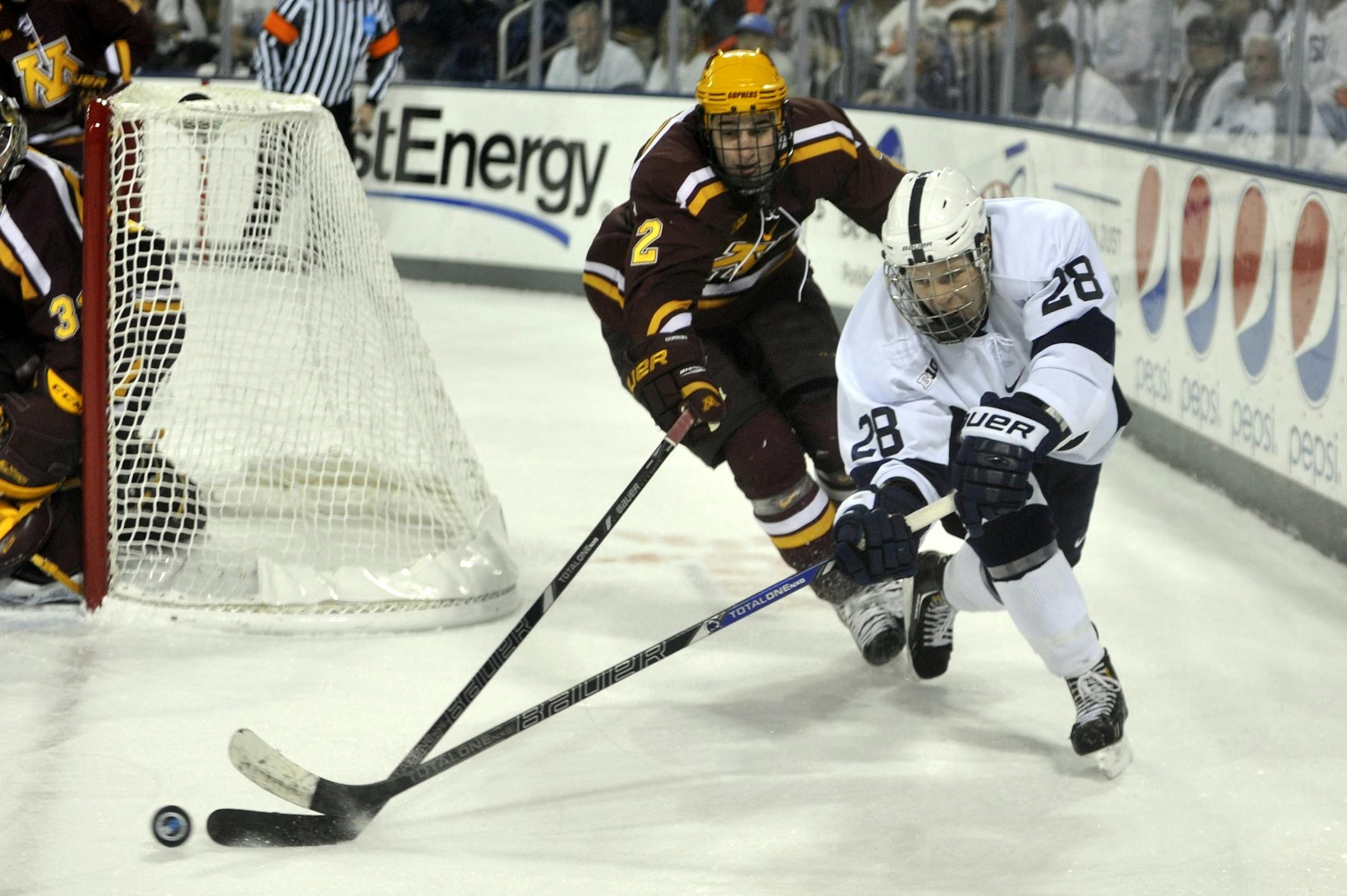 Gophers defenseman Brady Skjei pressured Penn State’s Taylor Holstrom during Monday night’s game in State College, Pa. The Gophers won 5-2 for a series sweep.