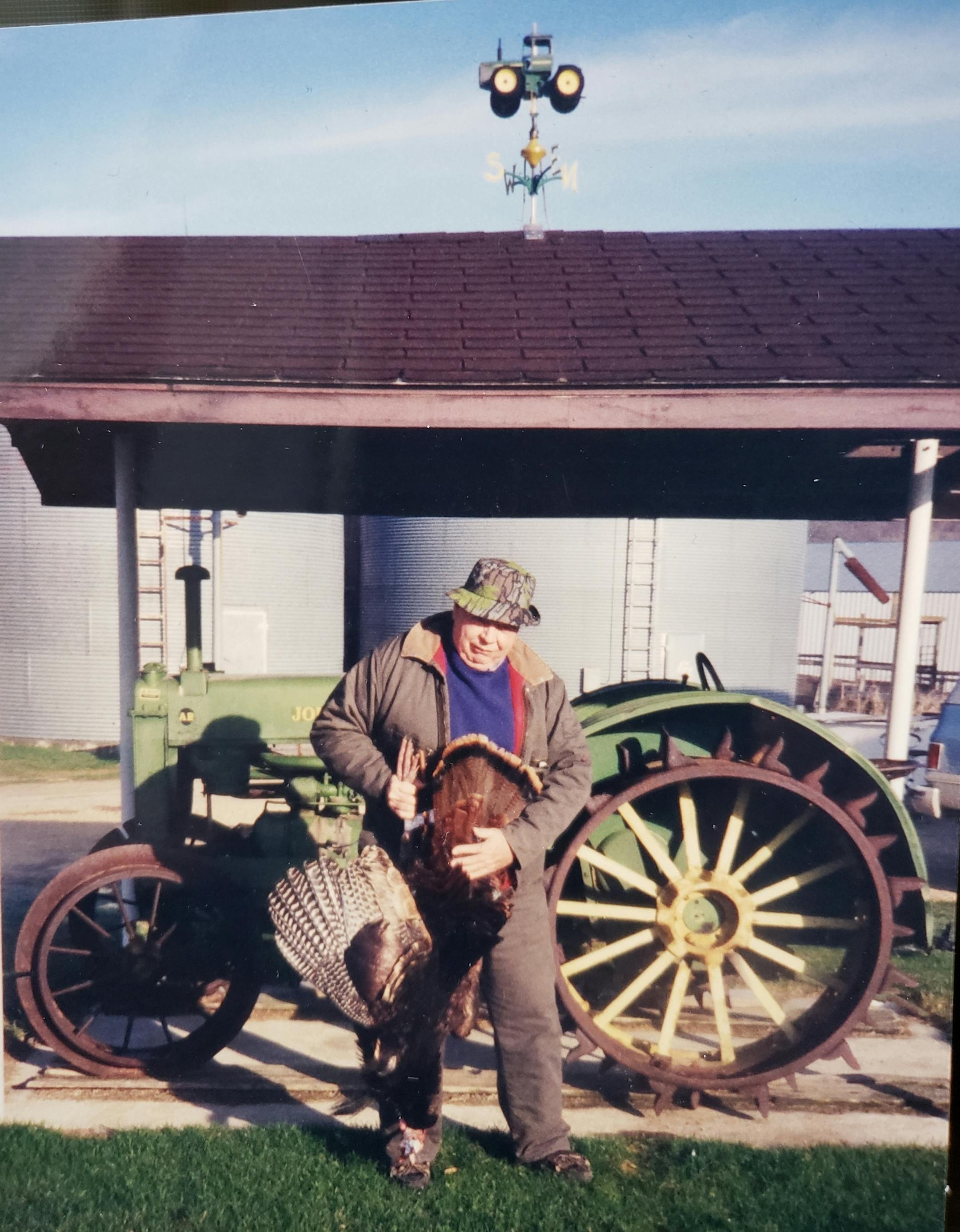 Farmer Jerry M. Lee, now 81, posing with a prize turkey he killed on the family farm in Houston County. His grandfather, John Lee, founded the farm in 1869 after he immigrated from Norway. The Lee Farm was one of 47 recognized this year as a sesquicentennial farm, while 136 farms were recognized for operating for 100 years.