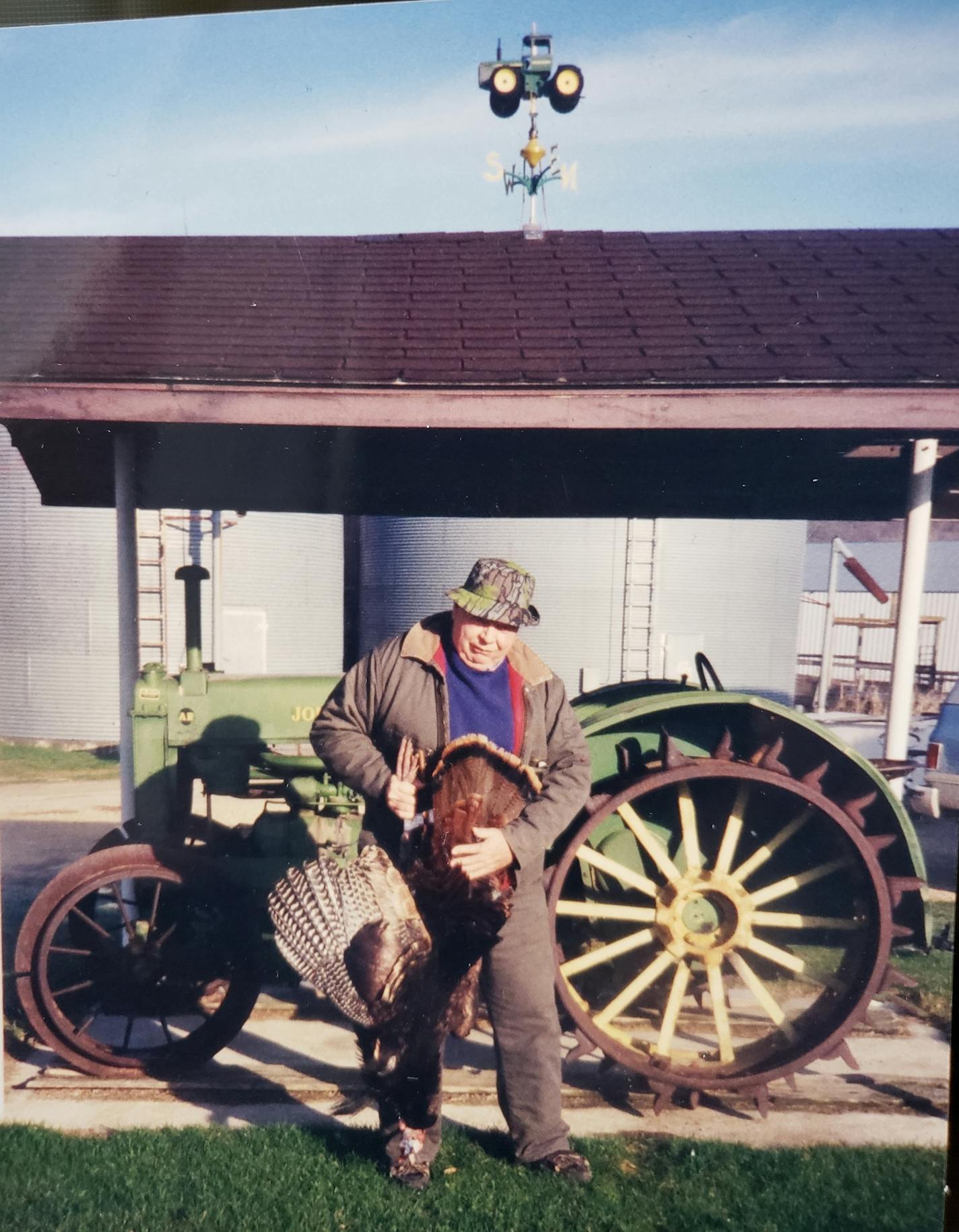 Farmer Jerry M. Lee, now 81, posing with a prize turkey he killed on the family farm in Houston County. His grandfather, John Lee, founded the farm in 1869 after he immigrated from Norway. The Lee Farm was one of 47 recognized this year as a sesquicentennial farm, while 136 farms were recognized for operating for 100 years.