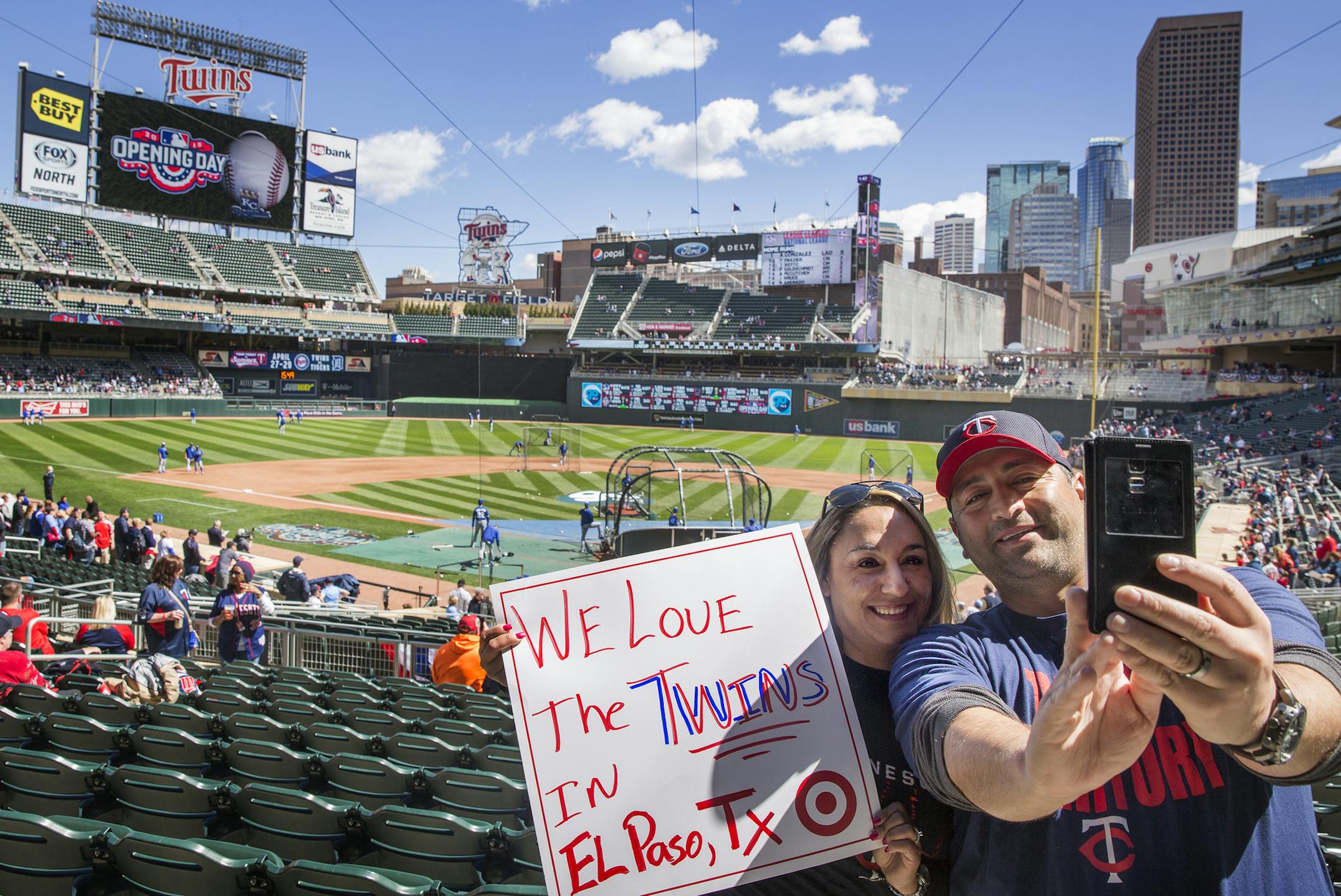 Vanessa and Bobby Vasquez, newlyweds from El Paso, Texas, take a selfie together before the Twins home opener against the Kansas City Royals at Target Field in Minneapolis on Monday, April 13, 2015. ] LEILA NAVIDI leila.navidi@startribune.com /