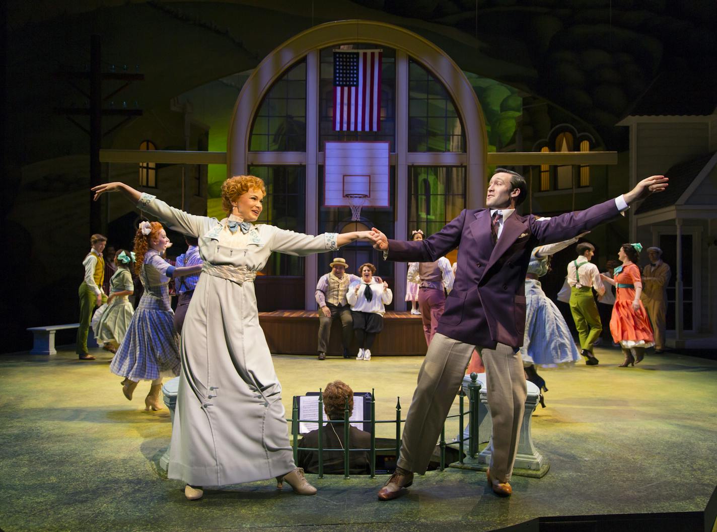 041: Stacie Bono (Marian Paroo), Danny Binstock (Harold Hill) and cast in the Guthrie Theater's production ofThe Music Man. Photograph &#xa9; T Charles Erickson