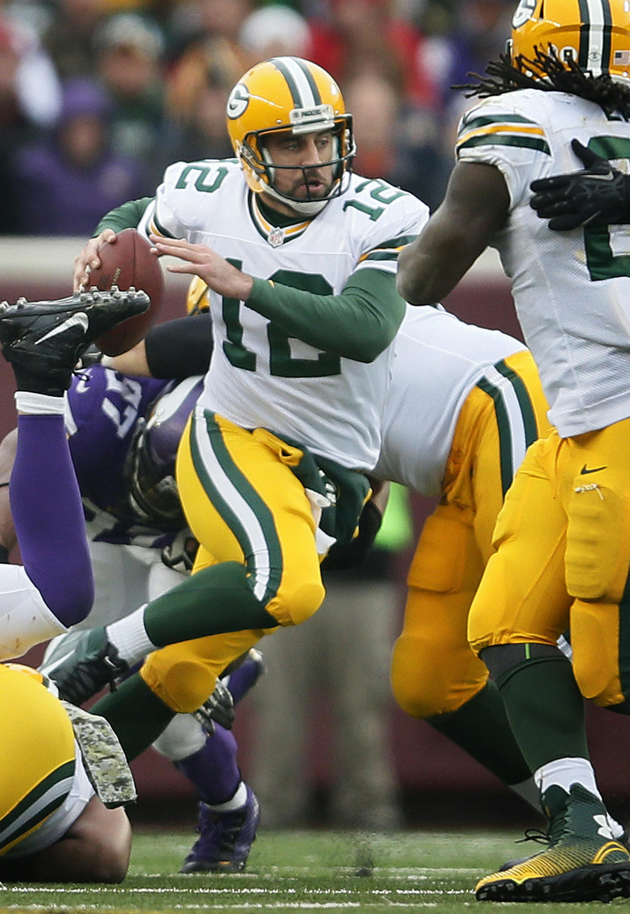 Green Bay Packers quarterback Aaron Rodgers (12) was forced out of the pocket in the second half Sunday November 23, 2014 in Minneapolis , Minnesota. ] The Minnesota Vikings hosted the Green Bay Packers at TCF Bank Stadium. Jerry Holt Jerry.holt@startribune.com