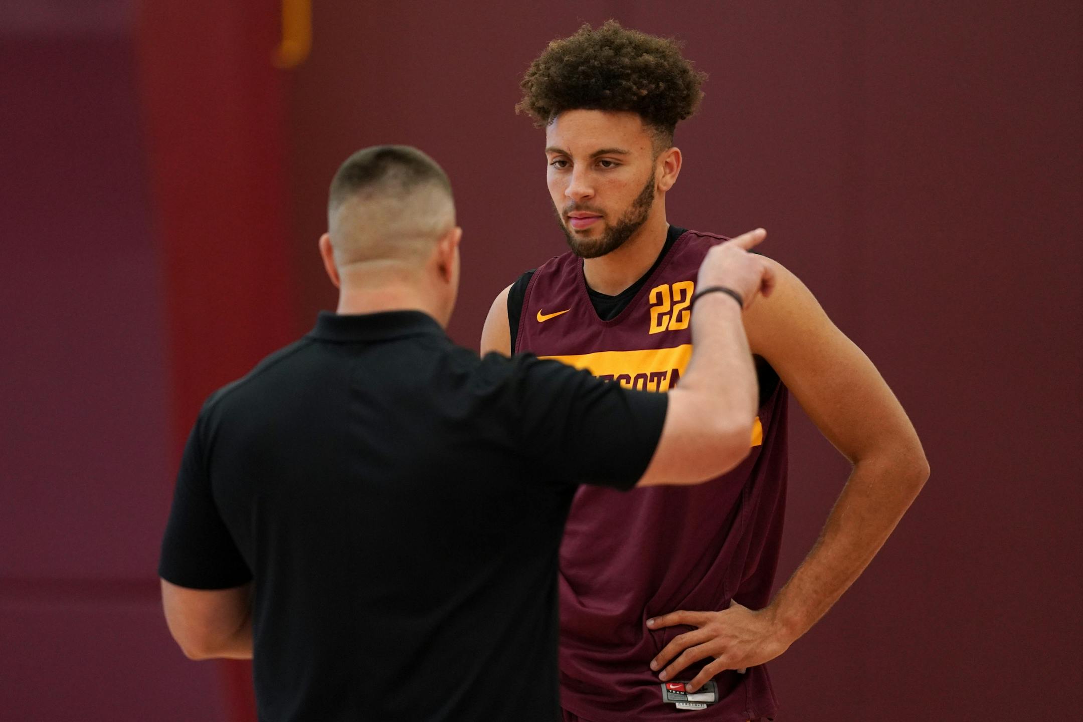 Gophers guard Gabe Kalscheur (22) got some coaching during Thursday's practice.