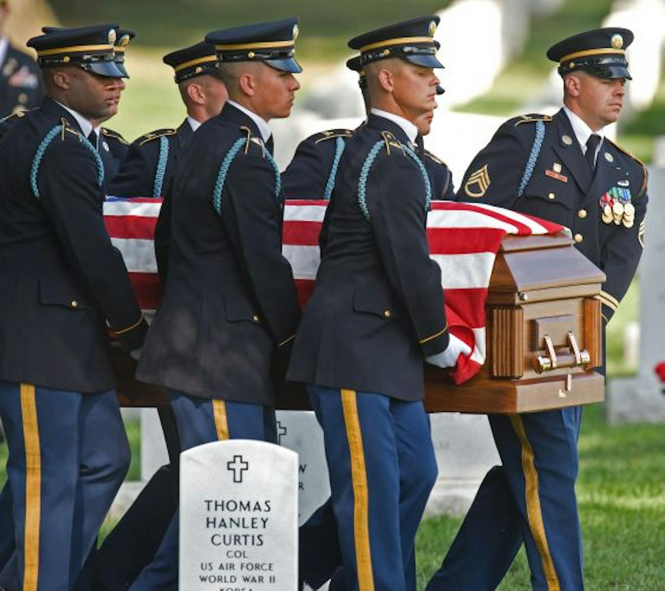US Army soldiers from the 3rd Infantry Regiment (The Old Guard) carry the casket of US Army Corporal Benjamin S. Kopp, at Section 60 inside Arlington National Cemetery August 07, 2009, near Washington, D.C. Kopp, a rifleman assigned to 3rd Battalion, 75th Ranger Regiment at Fort Benning, GA, born on January 20, 1998, was killed on July 10 while on duty for Operation Enduring Freedom in Afghanistan. AFP PHOTO Paul J. RICHRAD