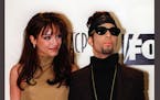 FILE - In this Feb. 8, 1997 file photo, Prince poses backstage with his wife Mayte at the 28th annual NAACP Image Awards in Pasadena, Calif.