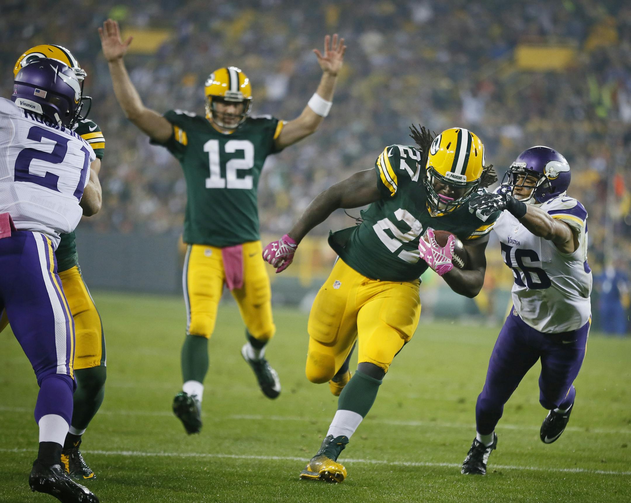 Green Bay Packers running back Eddie Lacy (27) ran pass Minnesota Vikings strong safety Robert Blanton (36) for a third quarter touchdown. The Minnesota Vikings played the Green Bay Packers Thursday October 2 , 2014 at Lambeau Field in Green Bay ,WI. ] Jerry Holt Jerry.holt@startribune.com